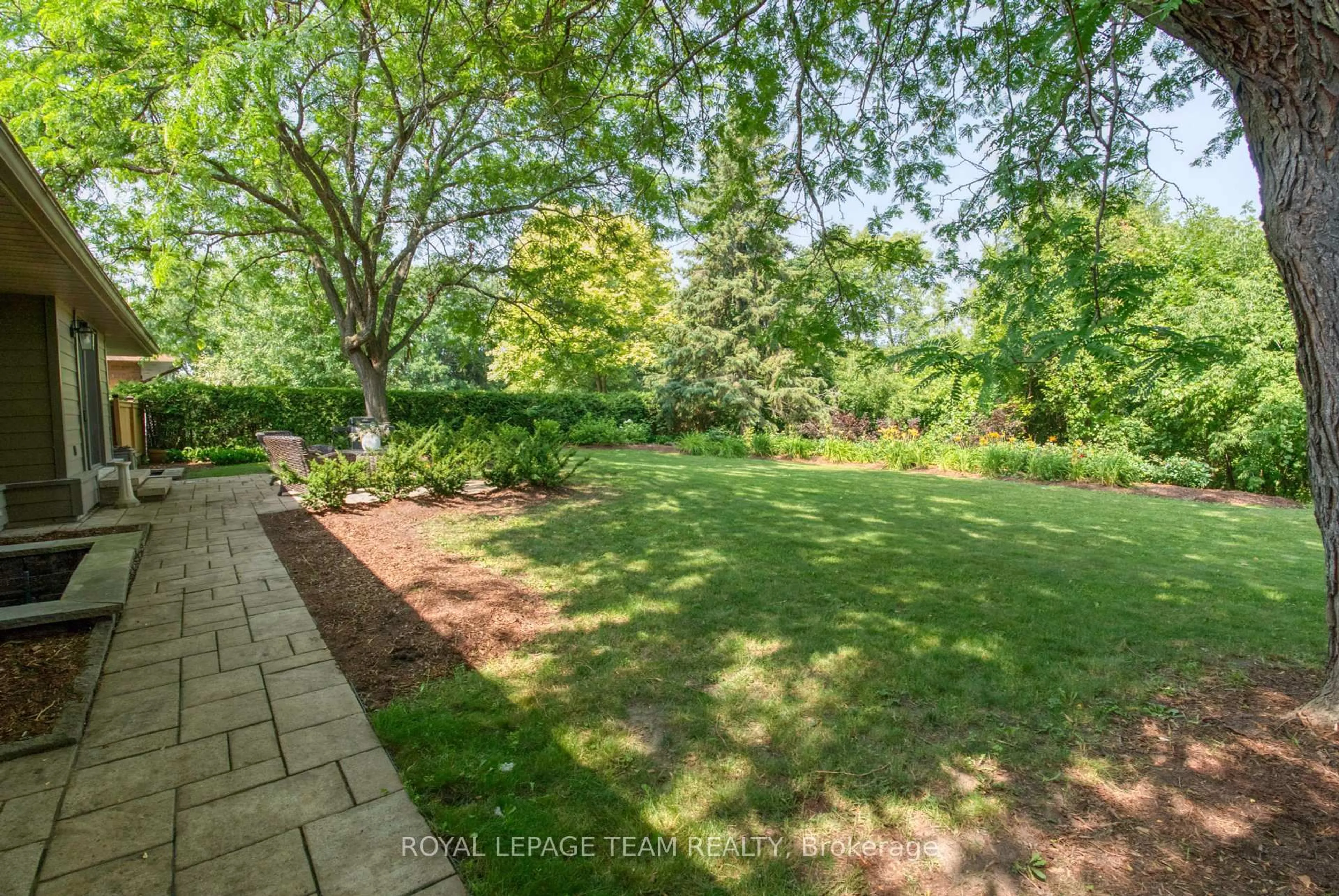 A pic from outside/outdoor area/front of a property/back of a property/a pic from drone, forest/trees view for 221 Penfield Dr, Ottawa Ontario K2K 1M8