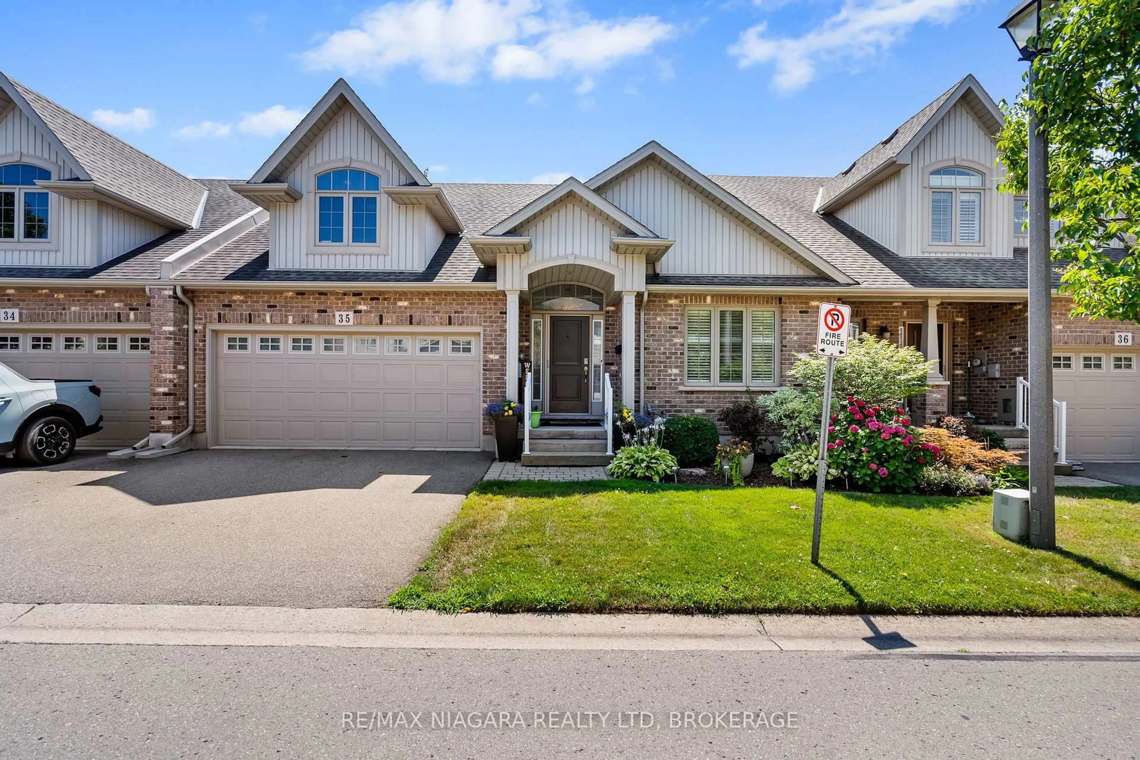 Home with brick exterior material, street for 7 GIBSON Pl #35, St. Catharines Ontario L2R 4H7