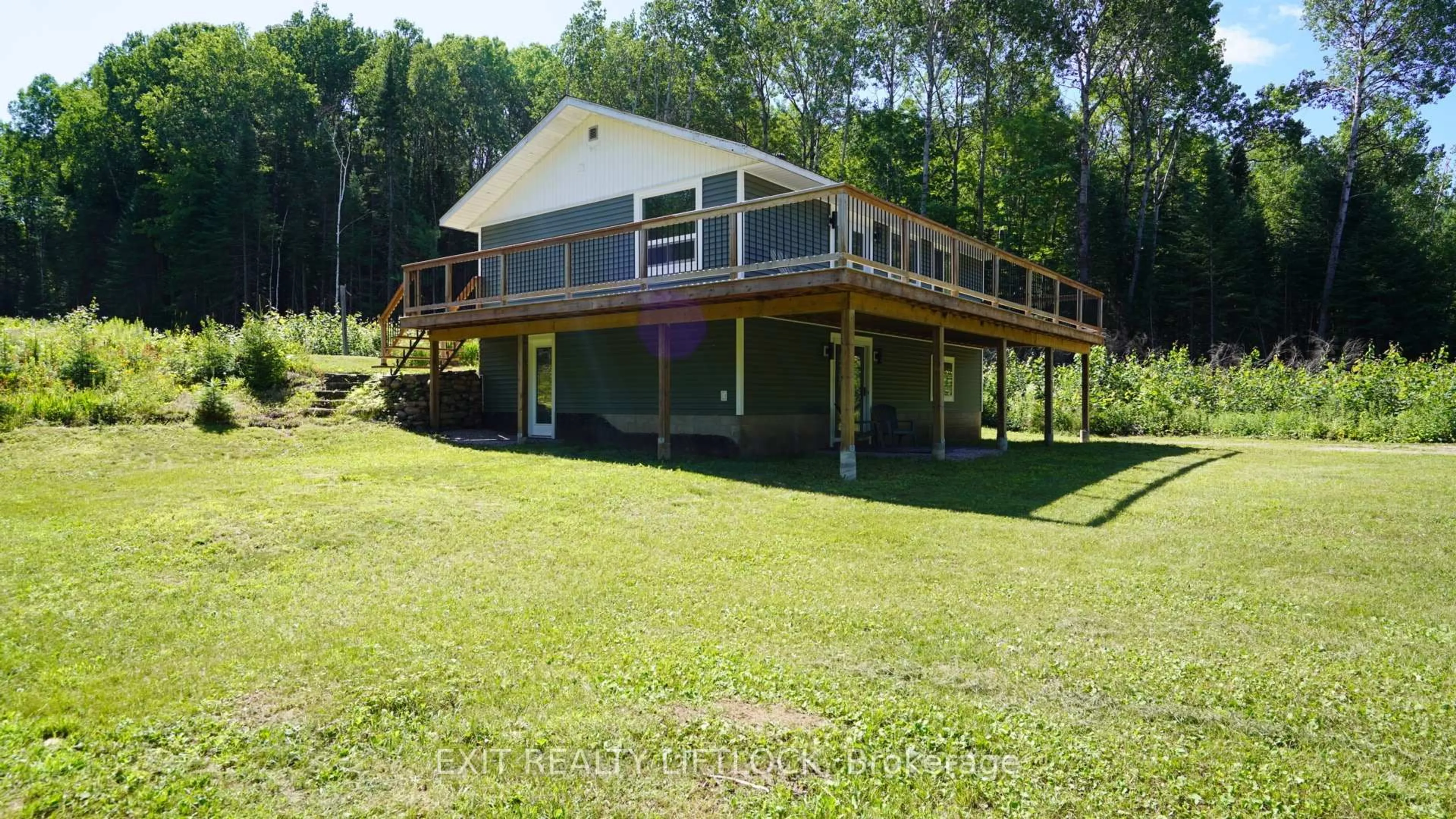 A pic from outside/outdoor area/front of a property/back of a property/a pic from drone, water/lake/river/ocean view for 868 Addington Rd, Quadeville Ontario K0J 2G0