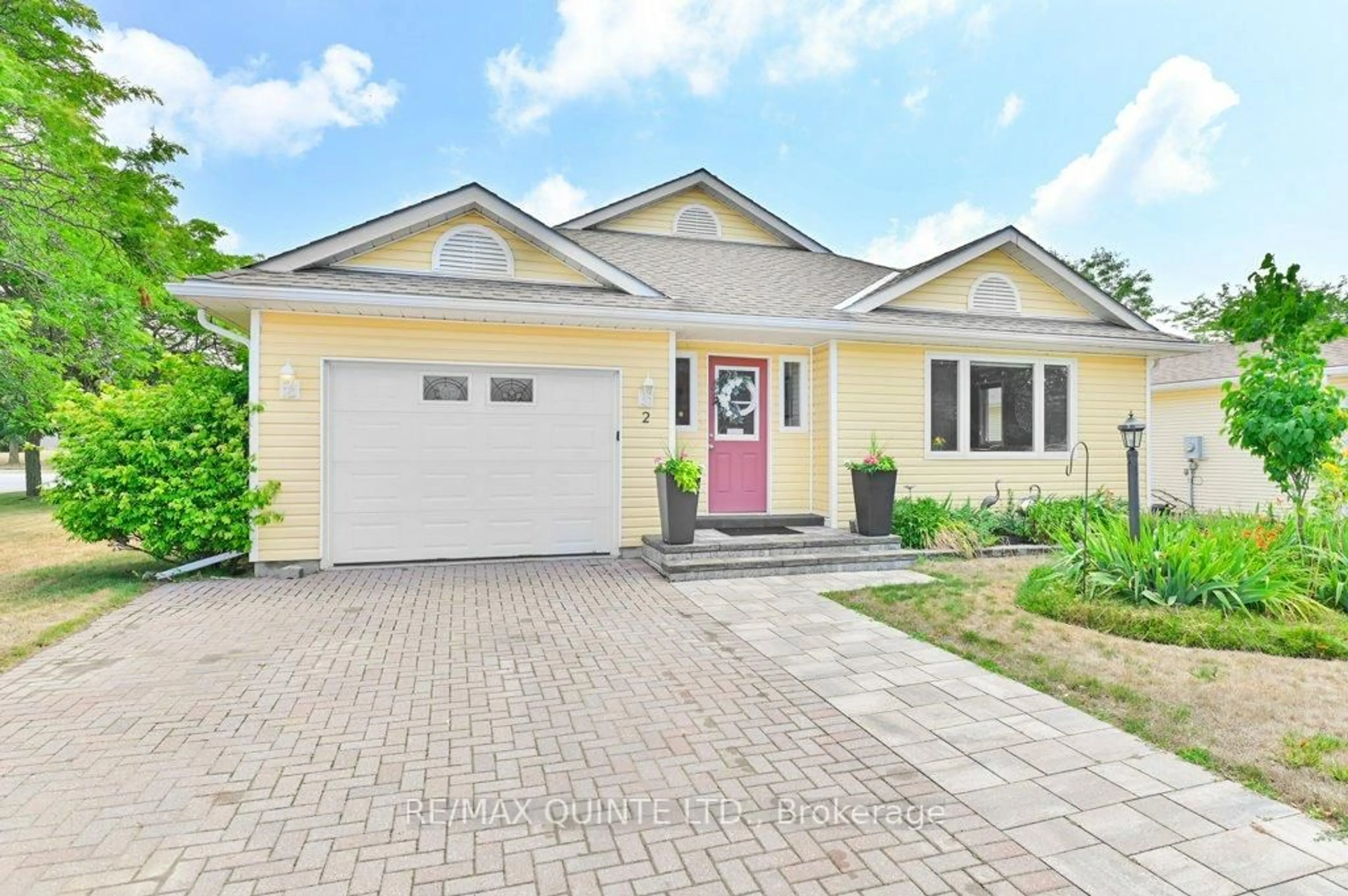 Home with vinyl exterior material, street for 2 Heritage Dr, Prince Edward County Ontario K0K 3L0