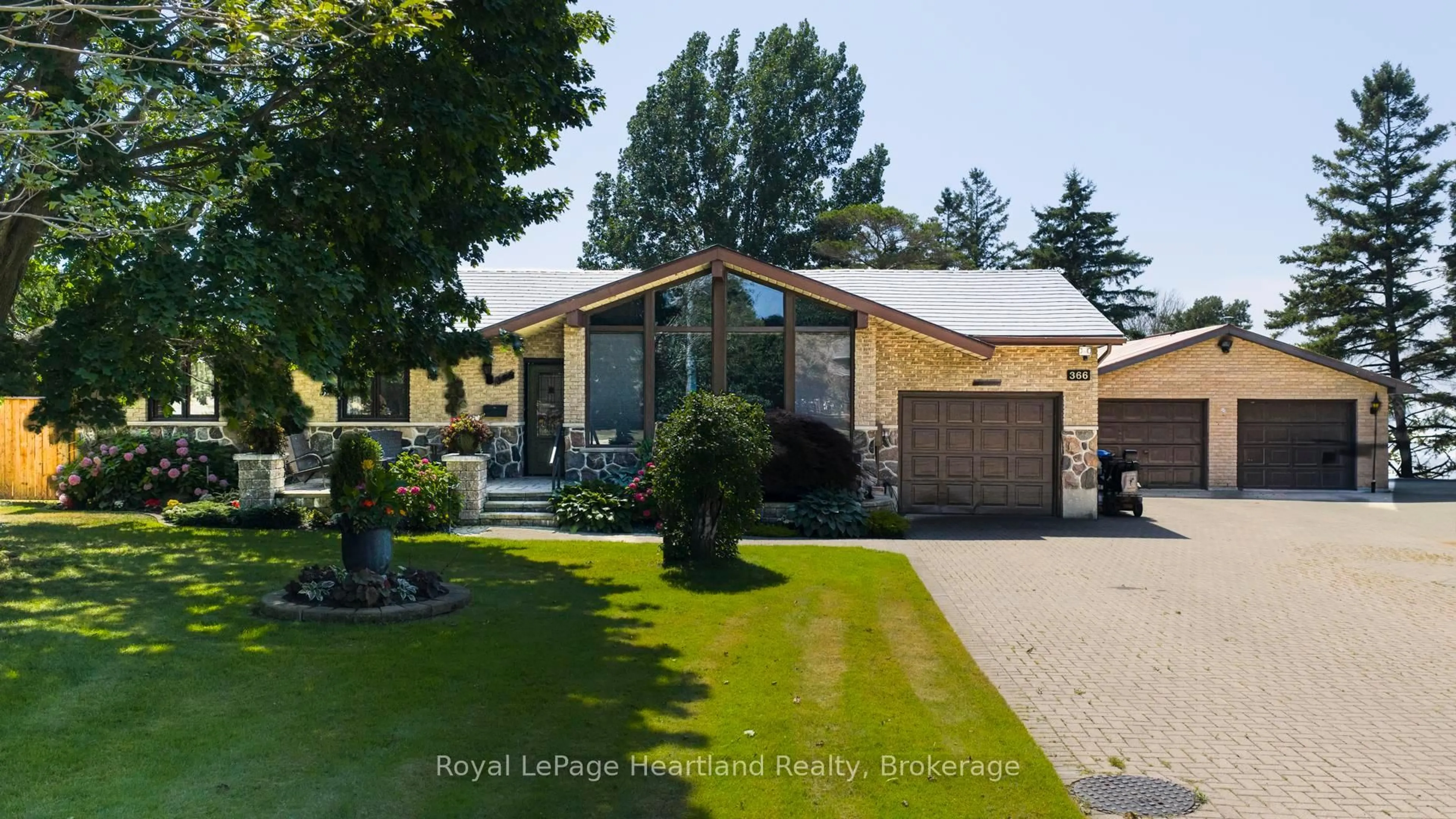 Home with vinyl exterior material, street for 366 Suncoast Dr, Goderich Ontario N7A 4B8