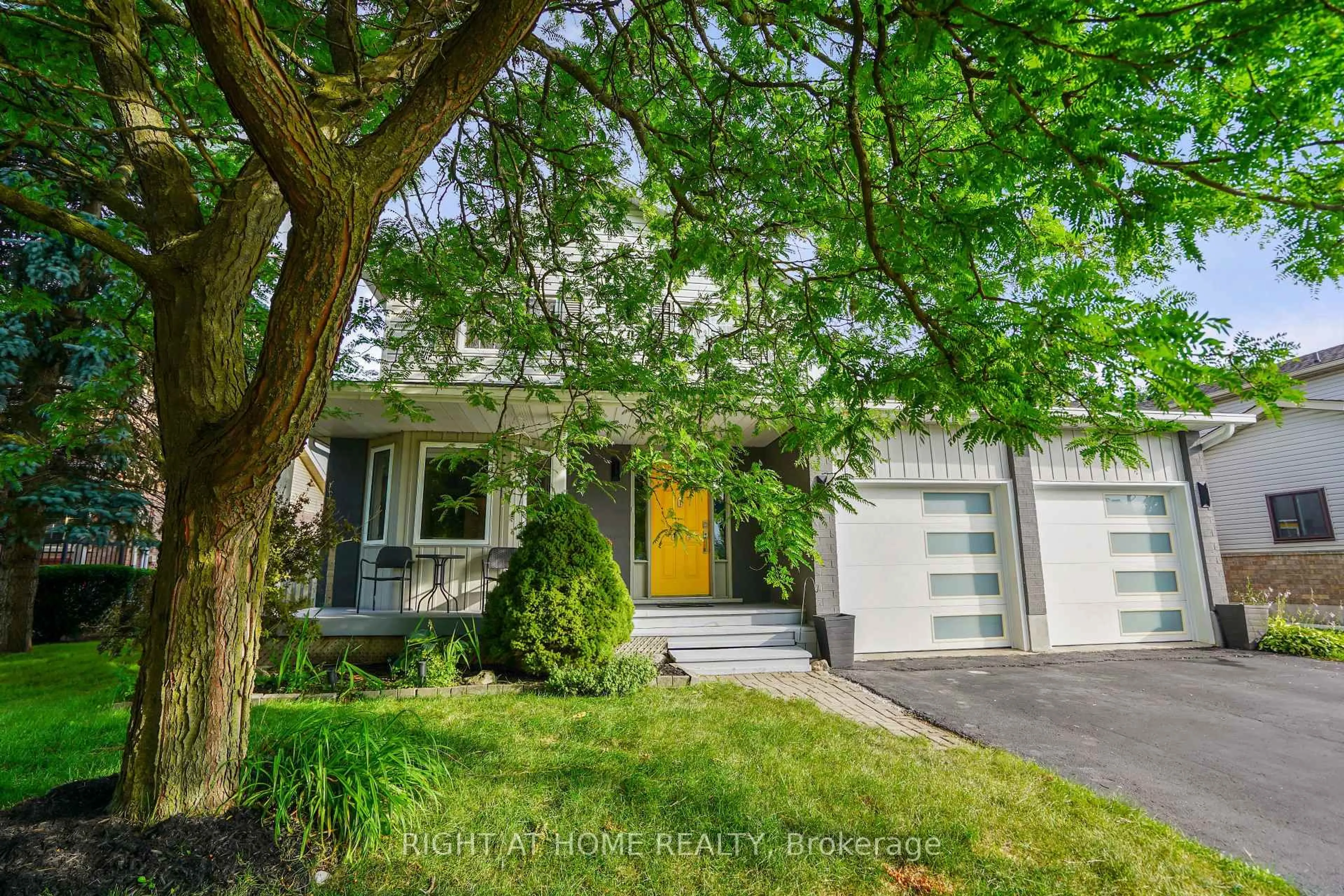 Home with vinyl exterior material, street for 616 Rummelhardt Dr, Waterloo Ontario N2T 2K7