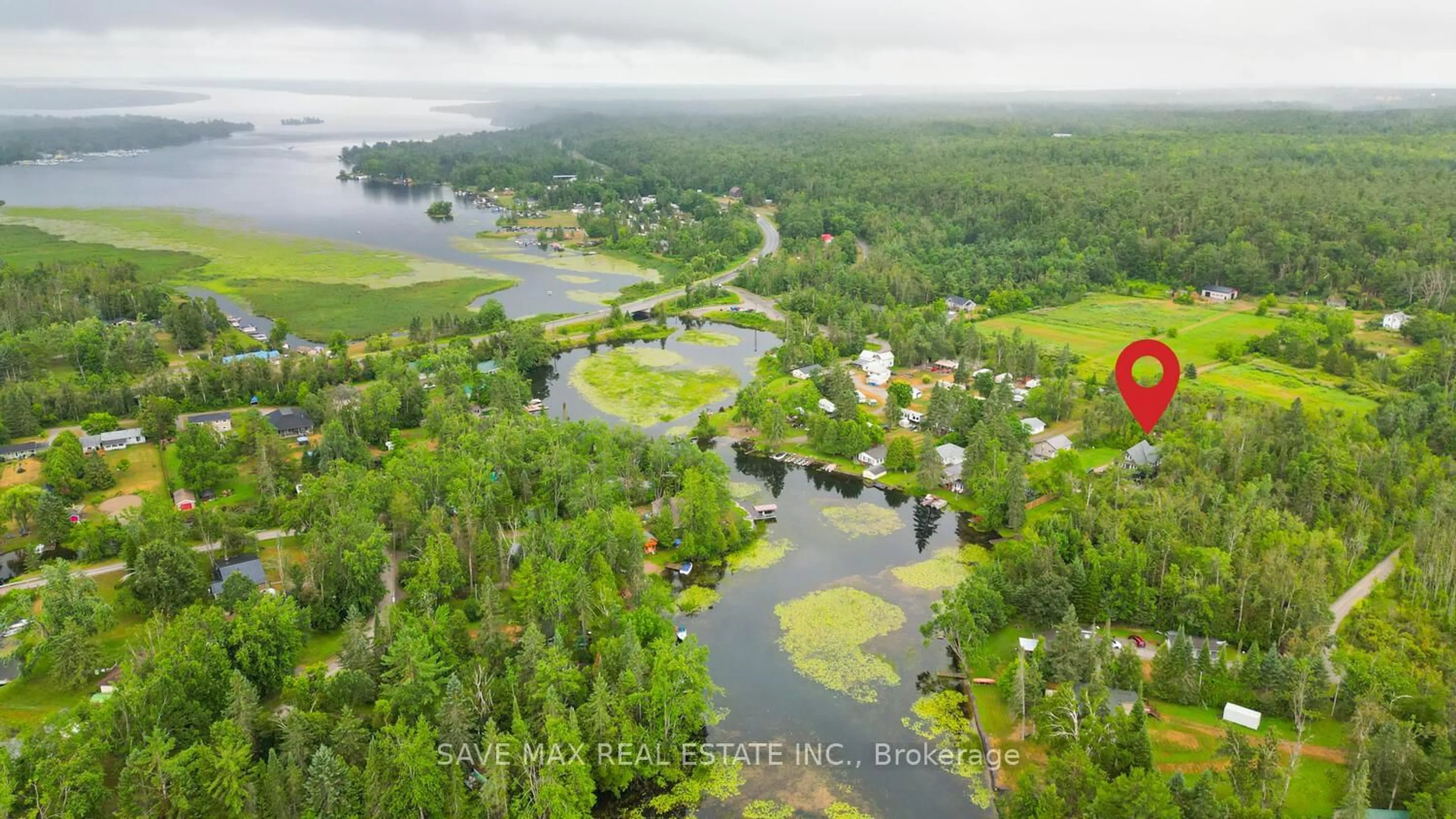 A pic from outside/outdoor area/front of a property/back of a property/a pic from drone, water/lake/river/ocean view for 44 Bass Lake Rd, Trent Lakes Ontario K0M 1A0