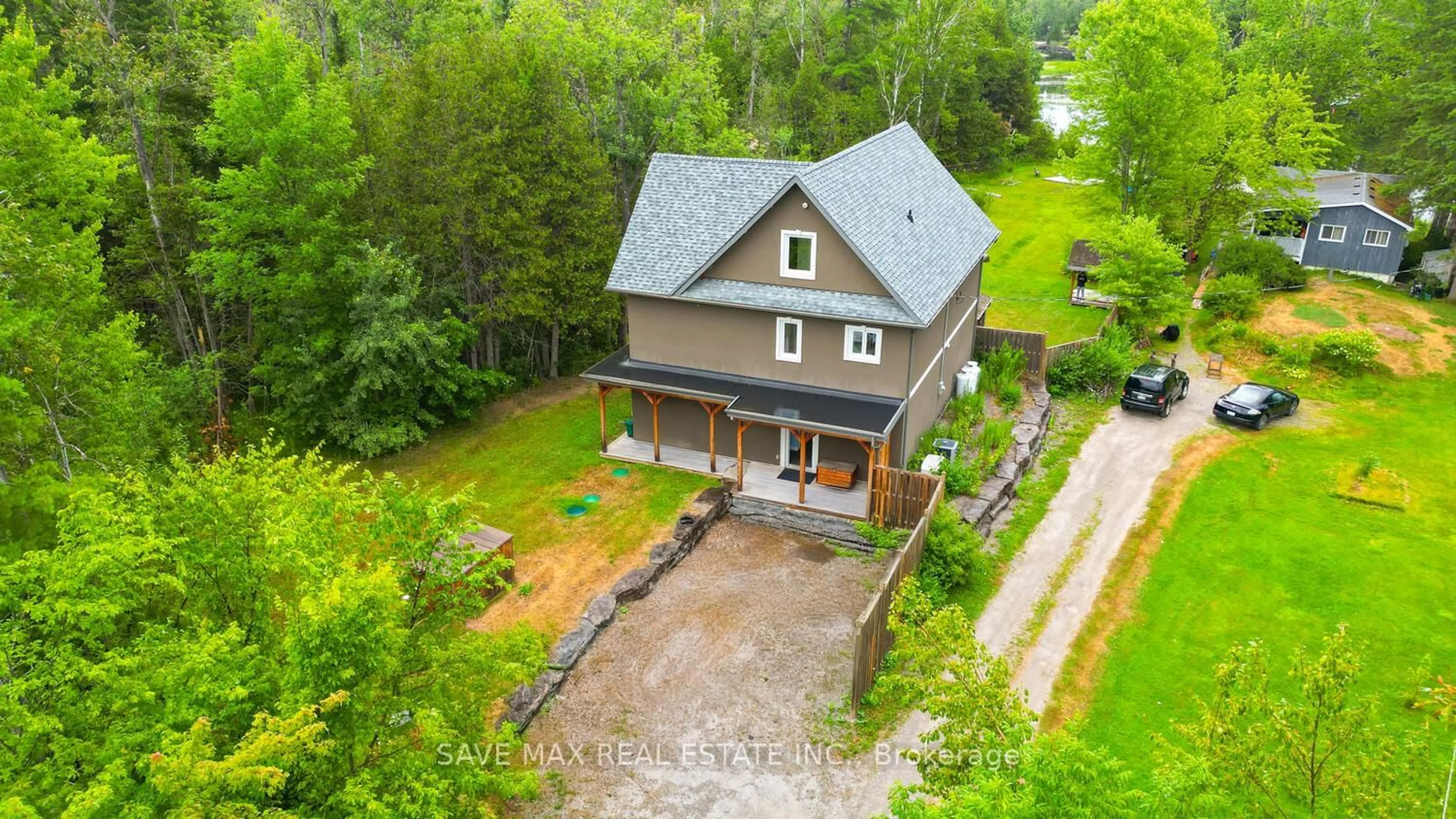 A pic from outside/outdoor area/front of a property/back of a property/a pic from drone, unknown for 44 Bass Lake Rd, Trent Lakes Ontario K0M 1A0