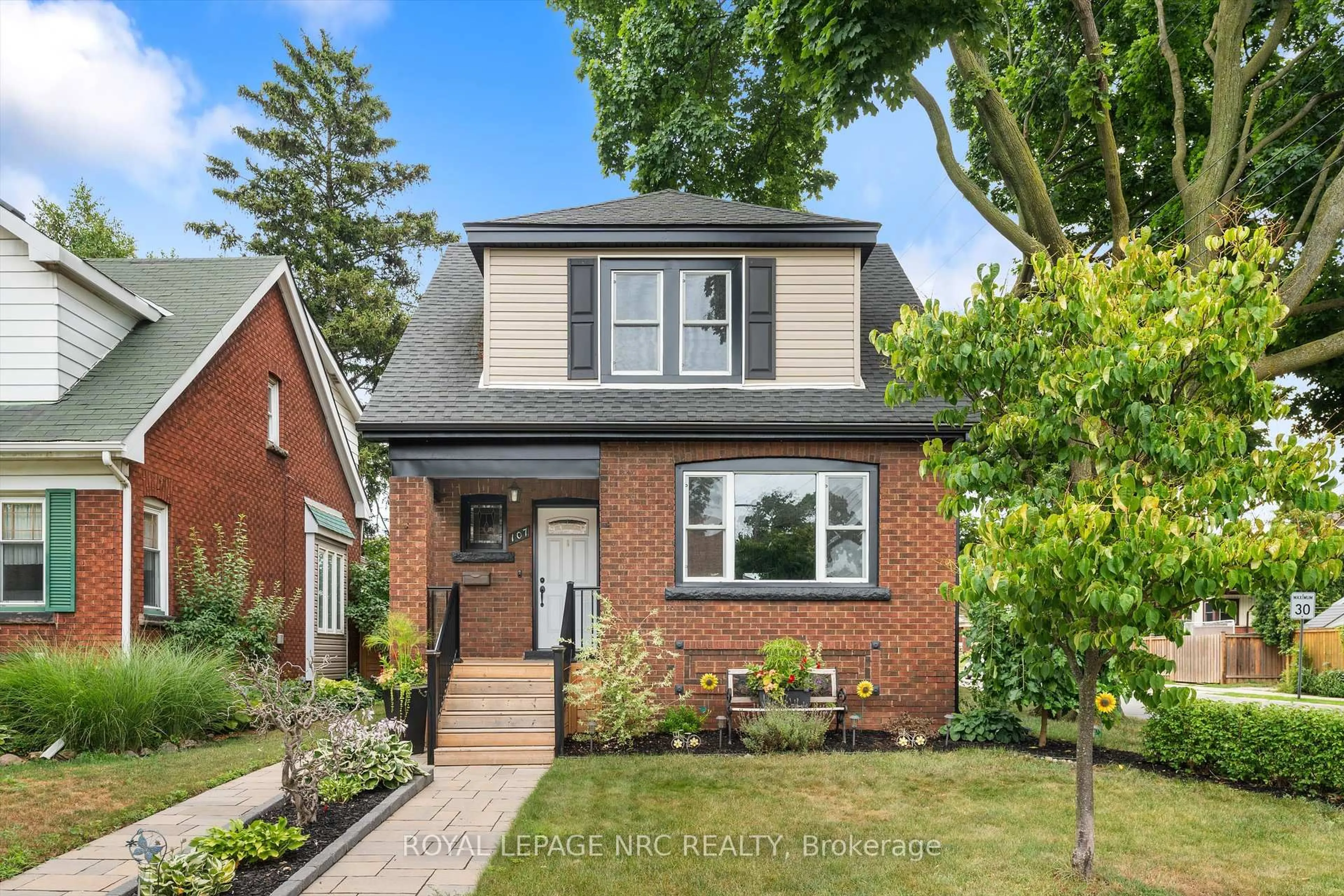 Home with brick exterior material, street for 107 Wexford Ave, Hamilton Ontario L8K 2N7
