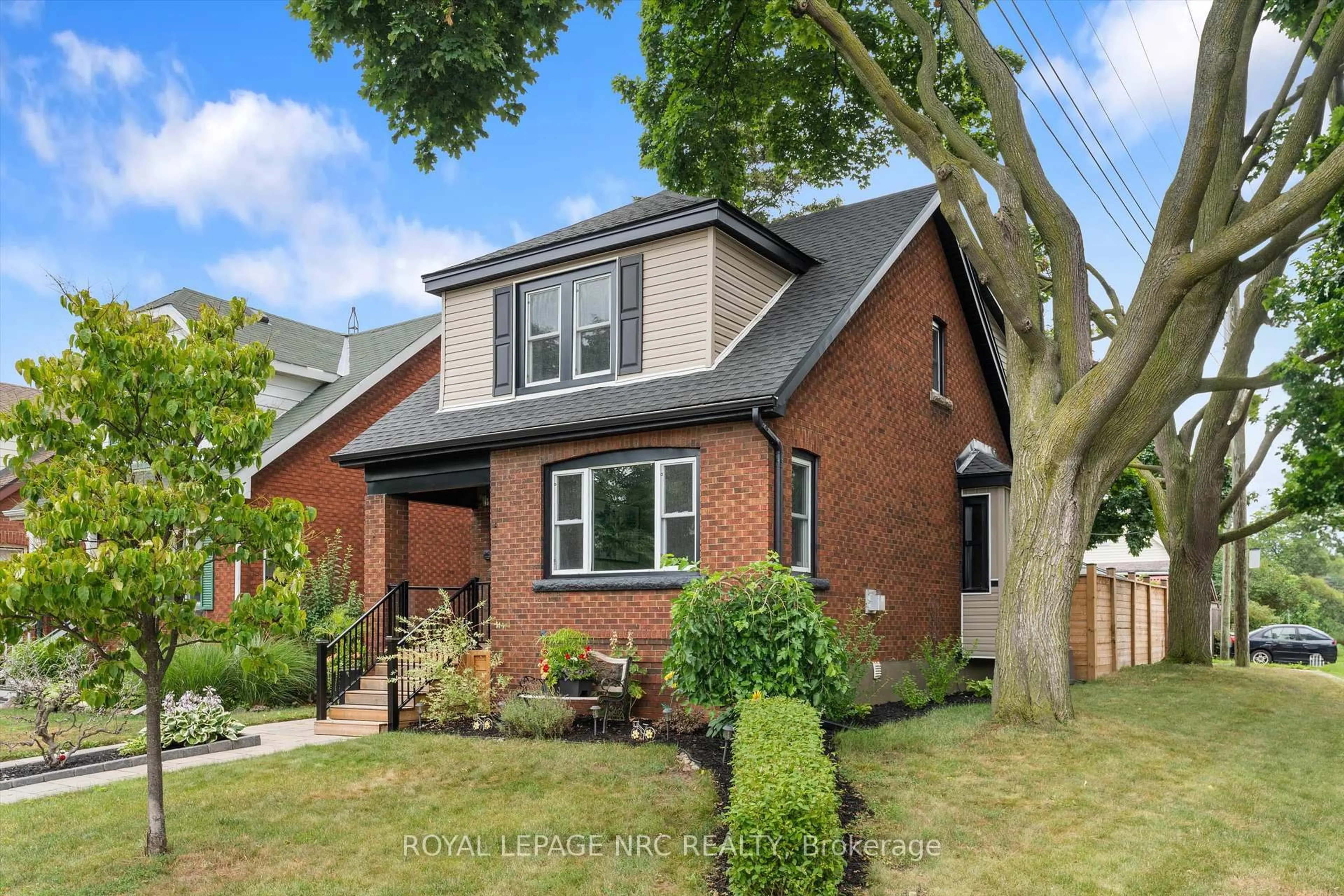 Home with brick exterior material, street for 107 Wexford Ave, Hamilton Ontario L8K 2N7