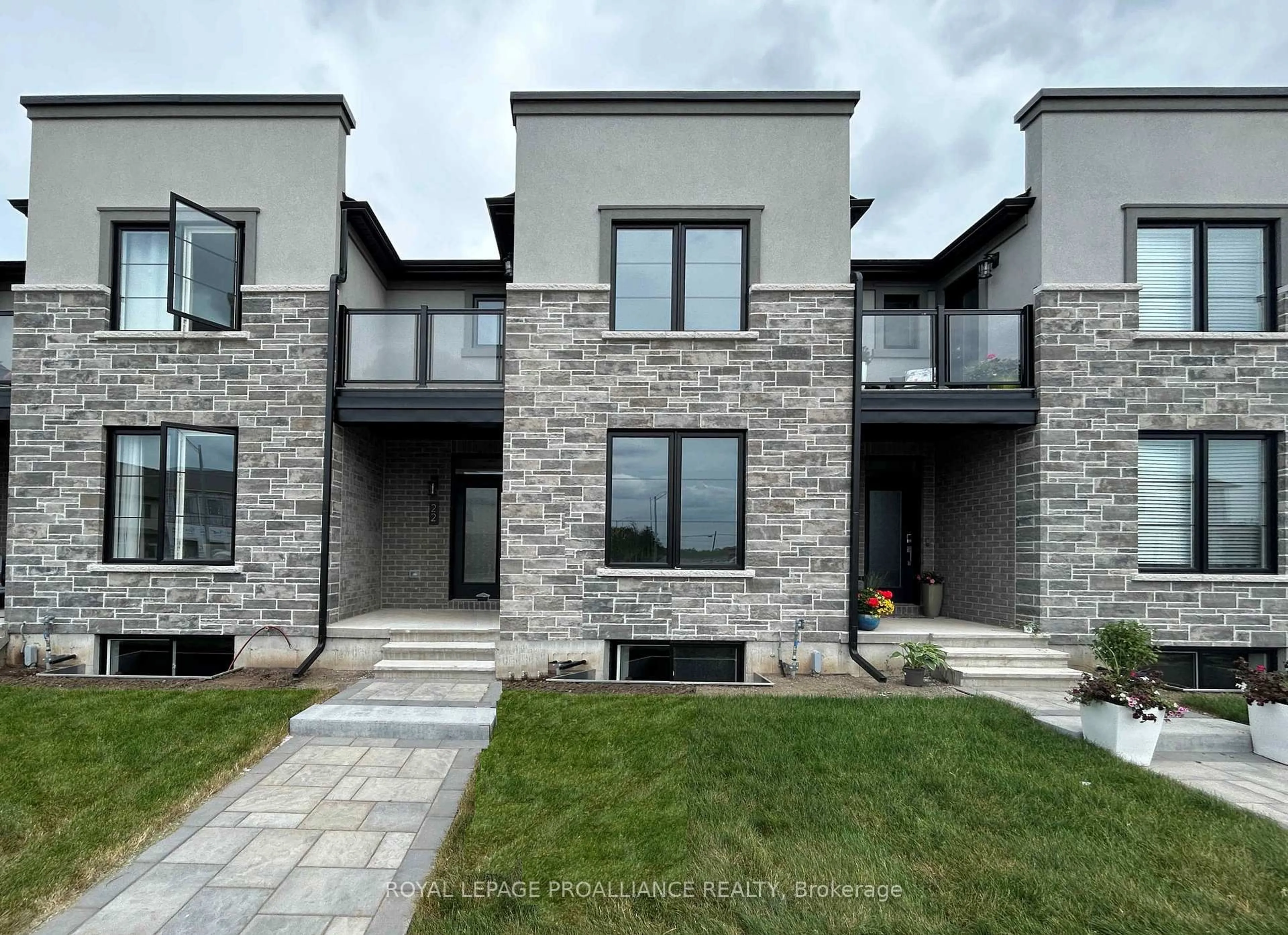 Home with brick exterior material, street for 22 Riverstone Way, Belleville Ontario K8N 0S6