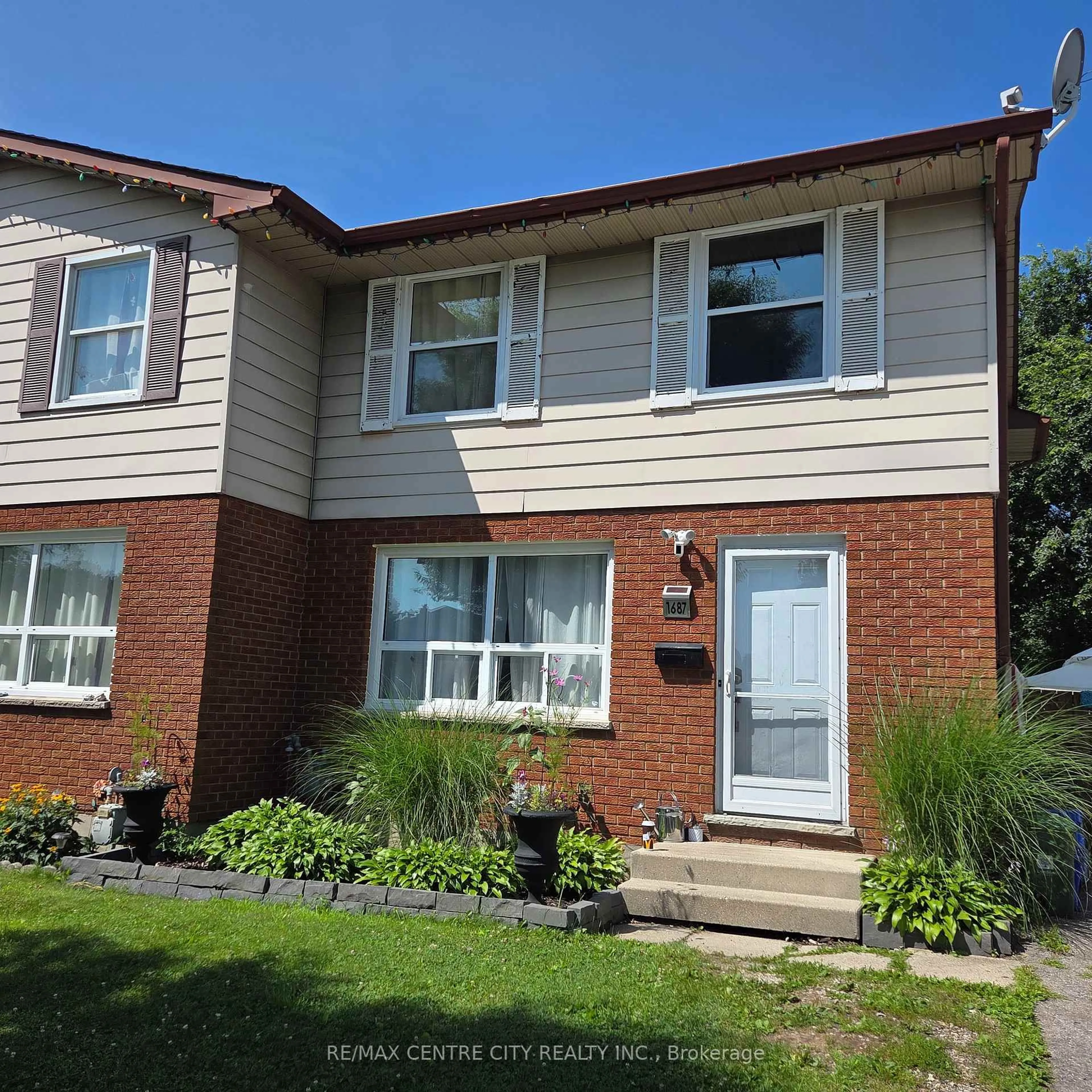 Home with brick exterior material, street for 1687 Ernest Ave, London South Ontario N6E 2S3