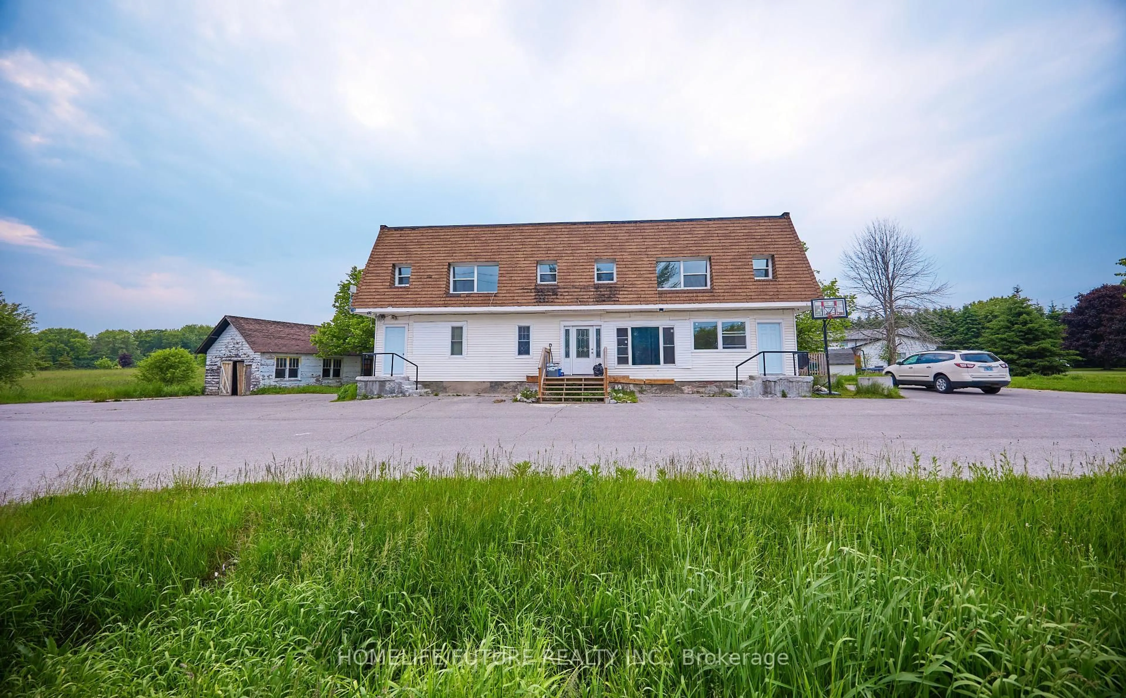 A pic from outside/outdoor area/front of a property/back of a property/a pic from drone, building for 15946 County Road 2, Brighton Ontario K0K 1H0