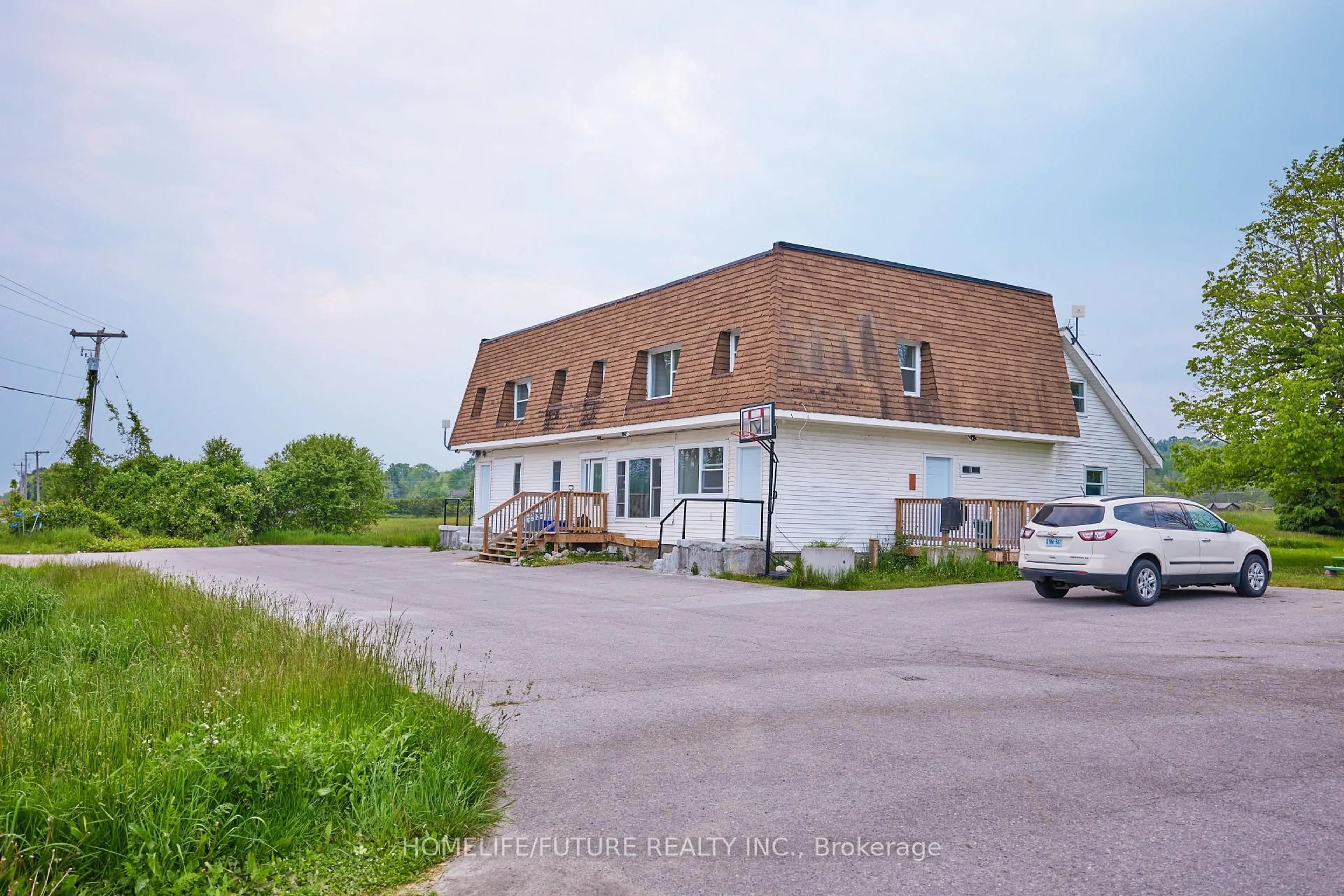 A pic from outside/outdoor area/front of a property/back of a property/a pic from drone, building for 15946 County Road 2, Brighton Ontario K0K 1H0