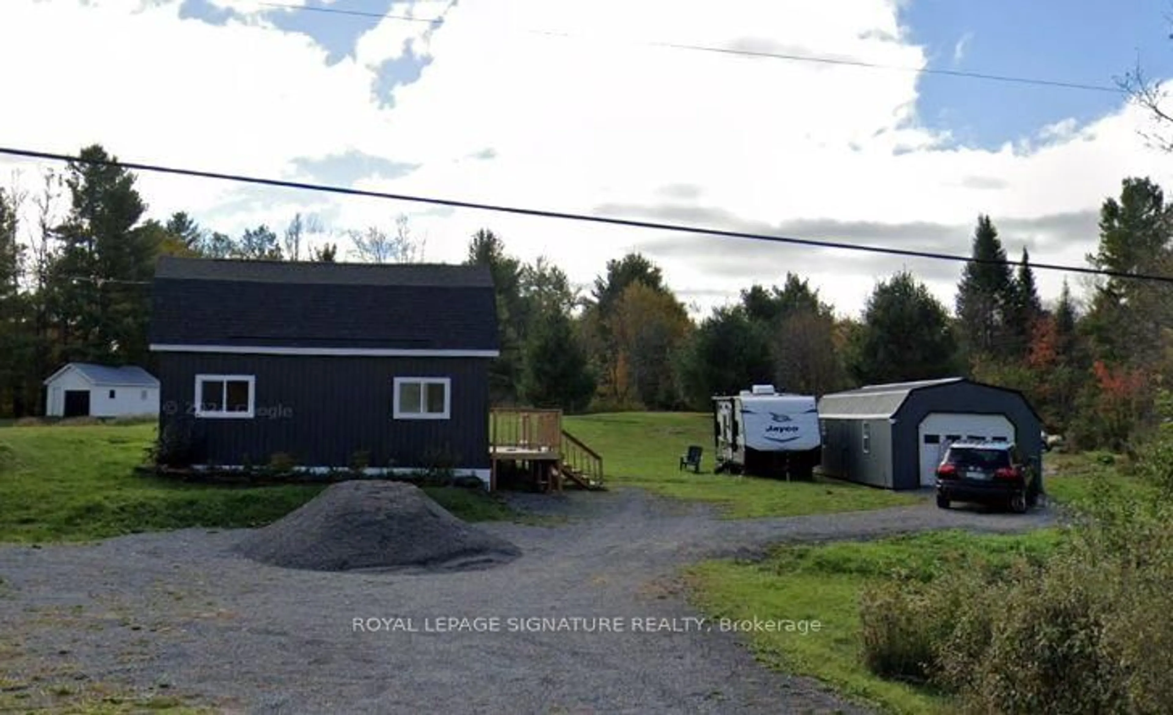 A pic from outside/outdoor area/front of a property/back of a property/a pic from drone, unknown for 108 Bannockburn Rd, Madoc Ontario K0K 2K0