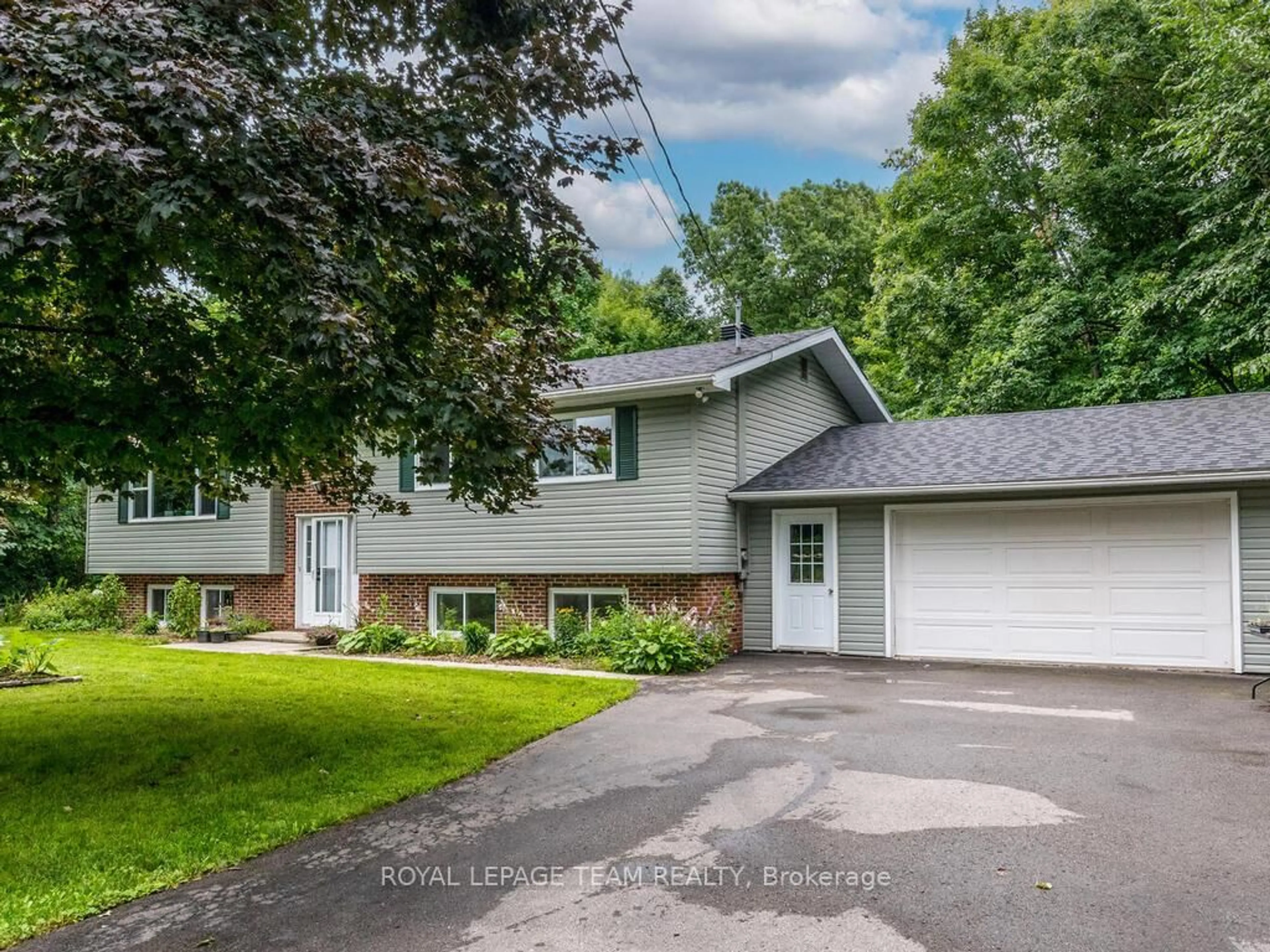 Home with vinyl exterior material, street for 6677 Roger Stevens Dr, Smiths Falls Ontario K7A 4S6