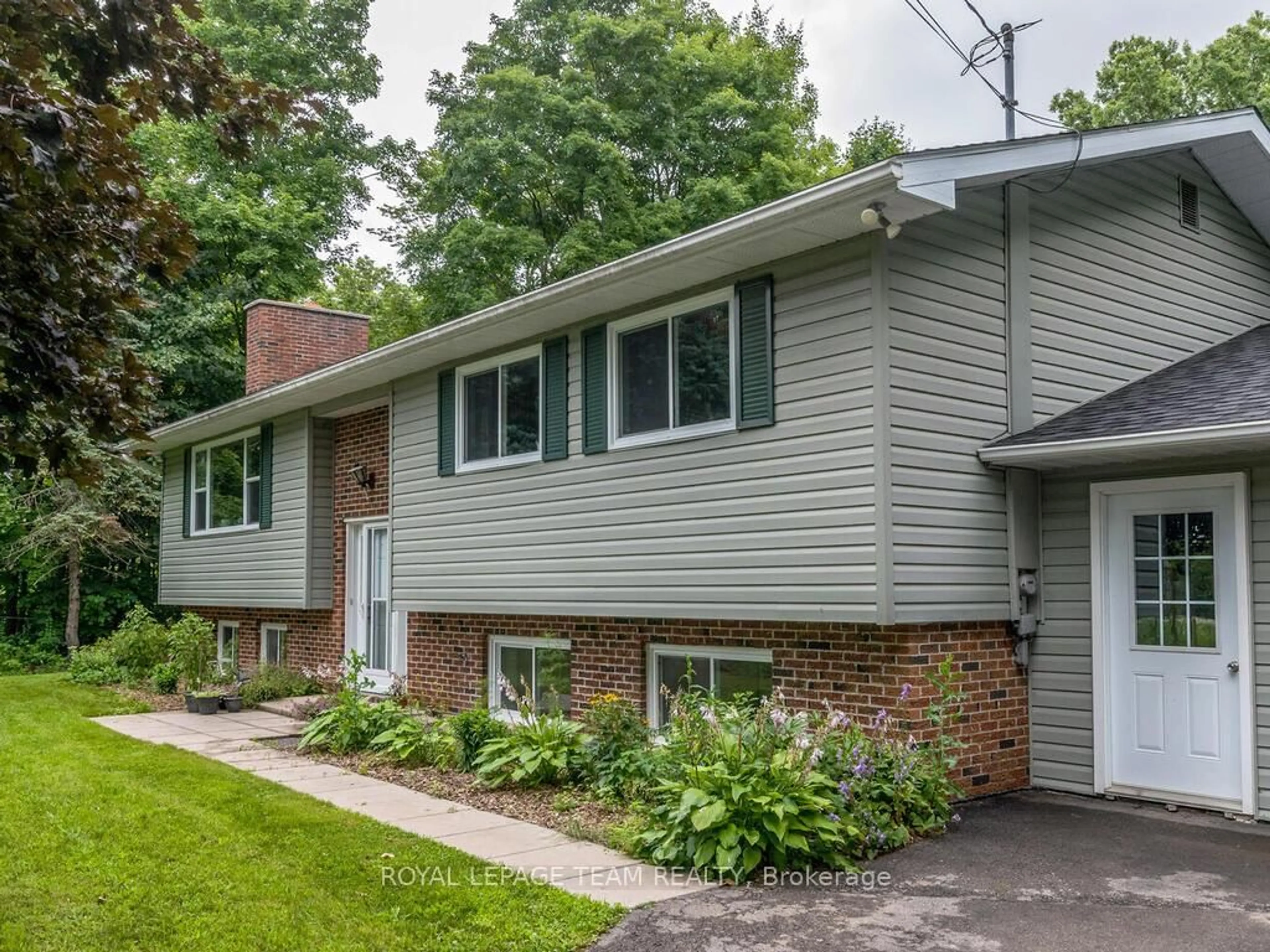 Home with vinyl exterior material, street for 6677 Roger Stevens Dr, Smiths Falls Ontario K7A 4S6
