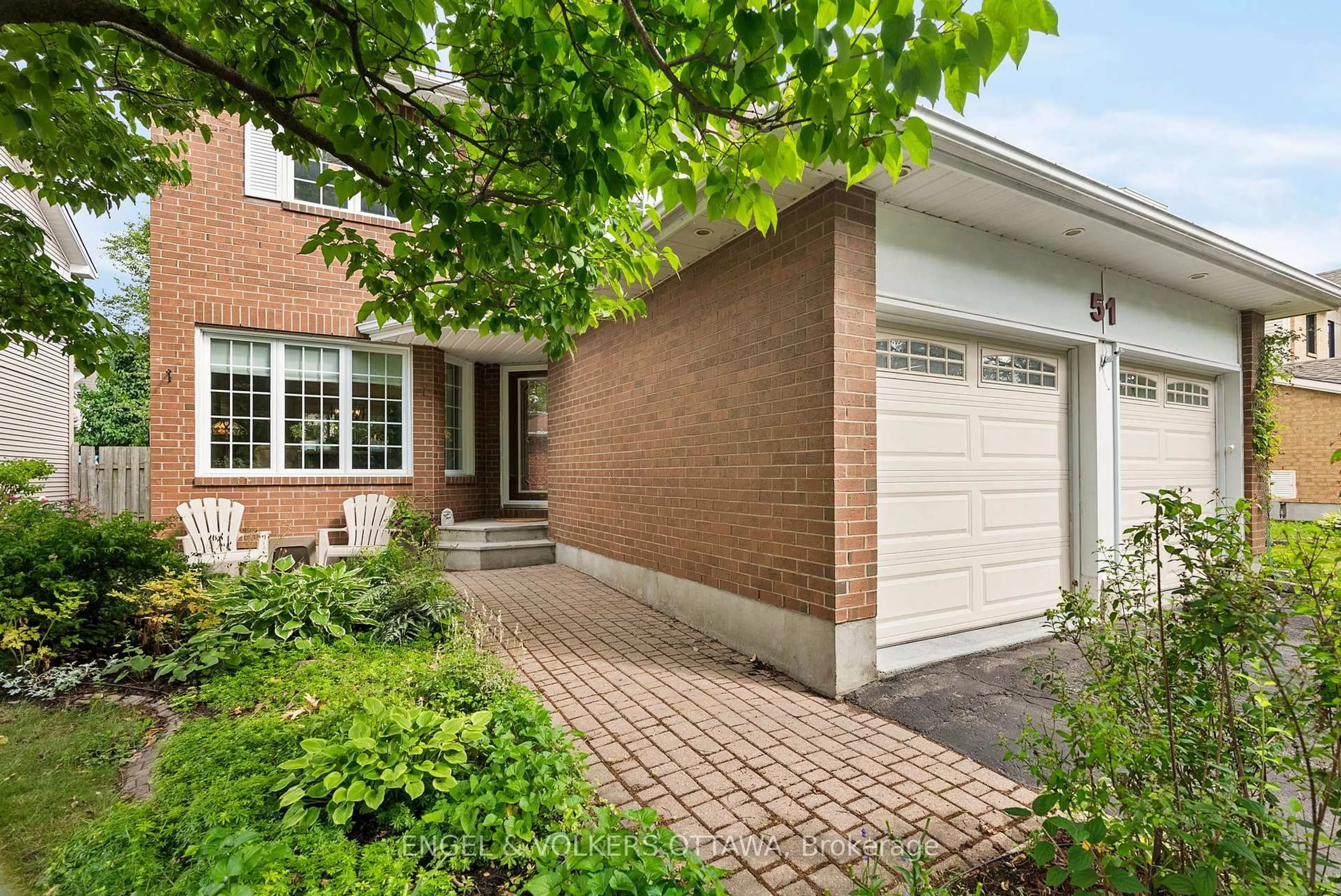 Home with brick exterior material, street for 51 Emerald Meadows Dr, Ottawa Ontario K2M 2L5