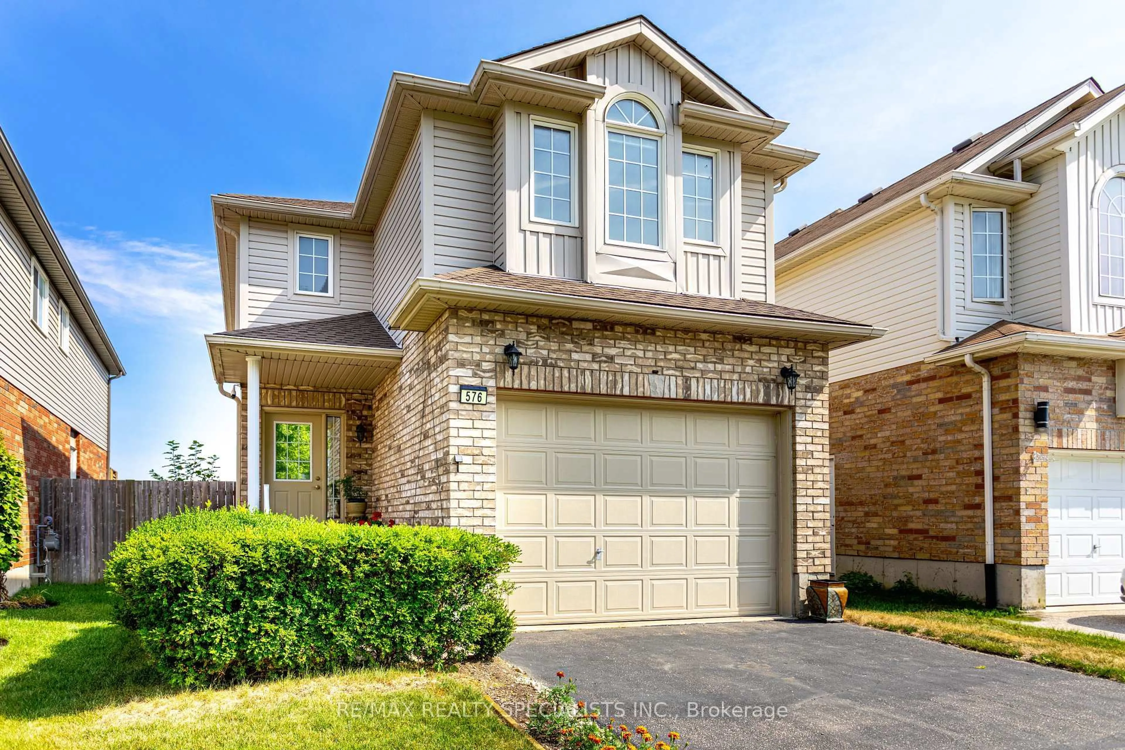Home with brick exterior material, street for 576 Activa Ave, Kitchener Ontario N2E 4C3