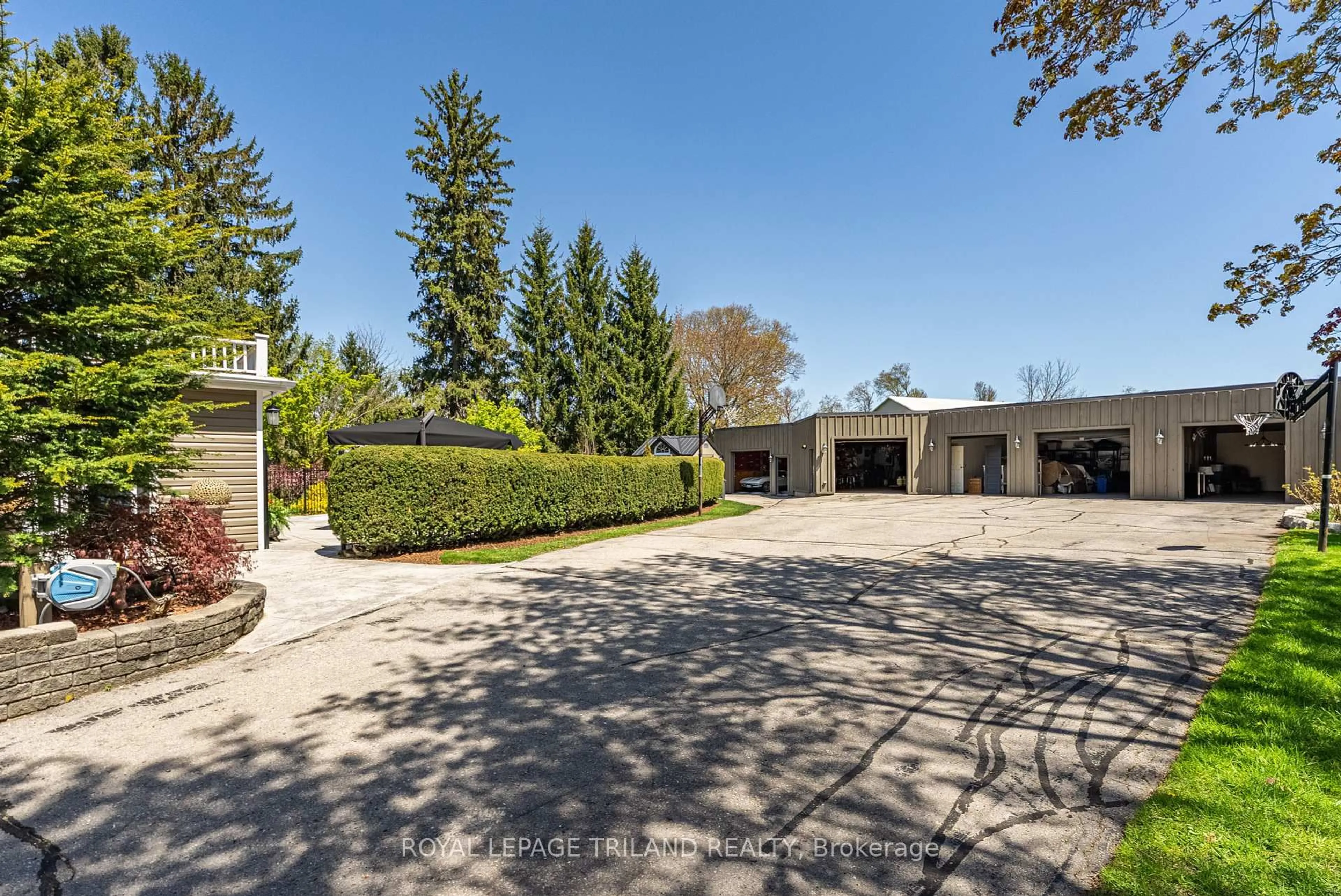 A pic from outside/outdoor area/front of a property/back of a property/a pic from drone, street for 6058 STONE CHURCH Rd, Central Elgin Ontario N0L 2L0