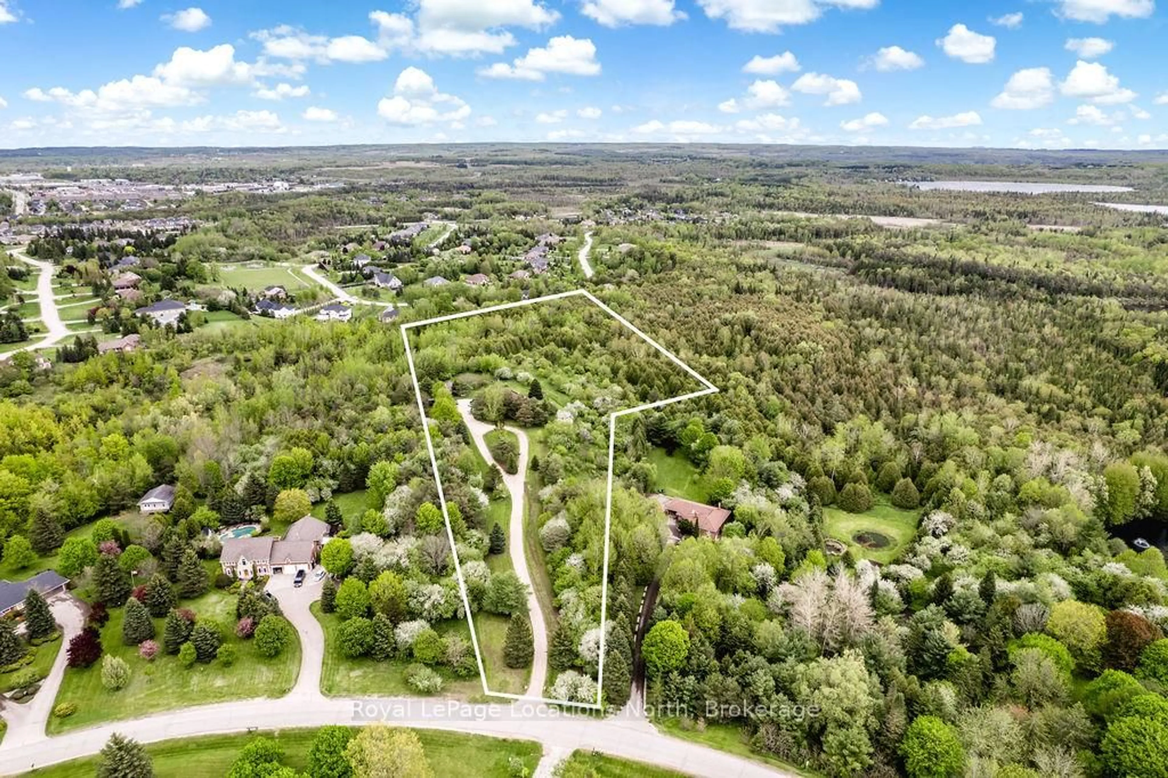 A pic from outside/outdoor area/front of a property/back of a property/a pic from drone, forest/trees view for 38 Old Carriage Rd, East Garafraxa Ontario L9W 6B2