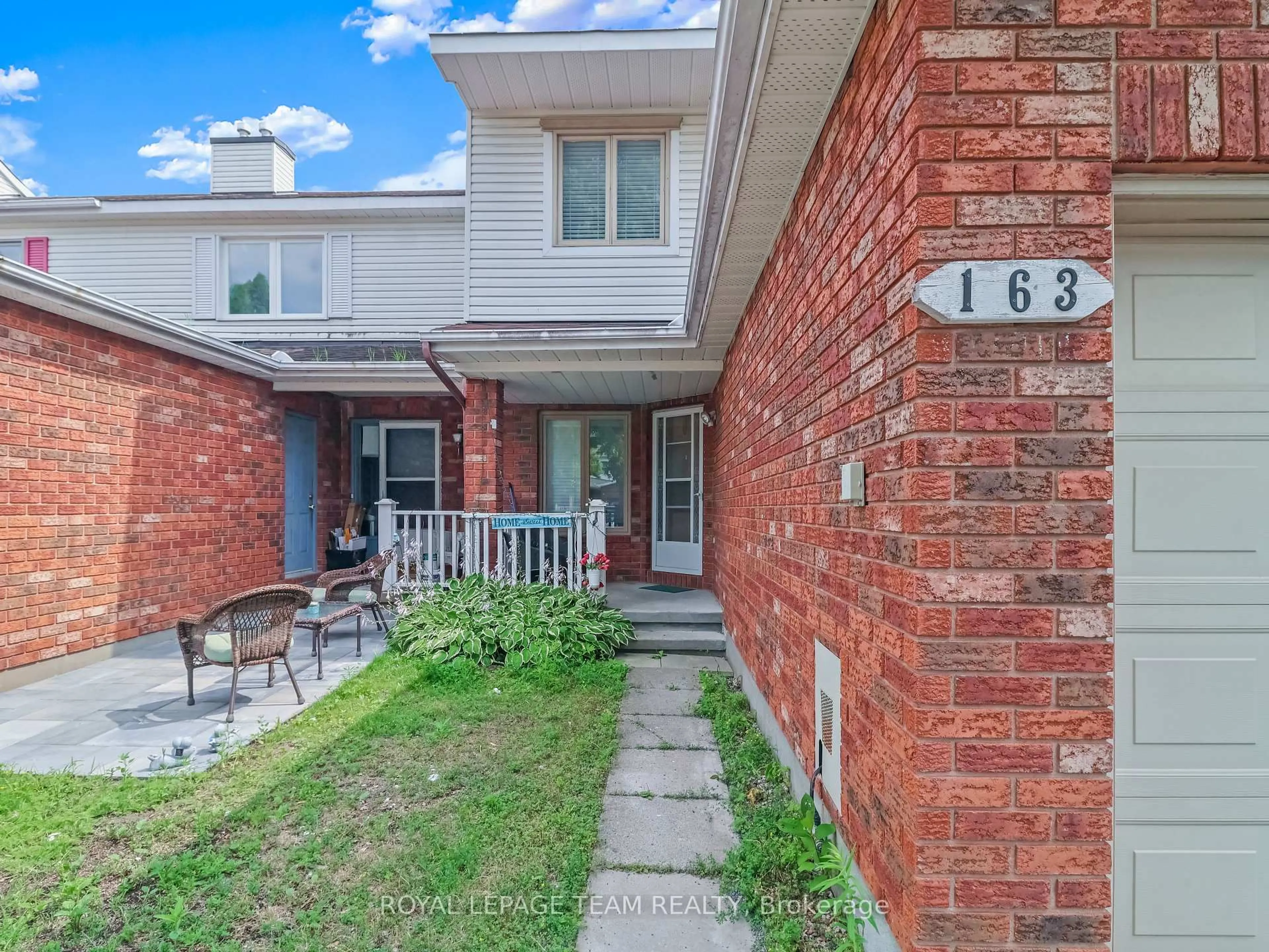 Home with brick exterior material, street for 163 Markland Cres, Ottawa Ontario K2G 5Z7