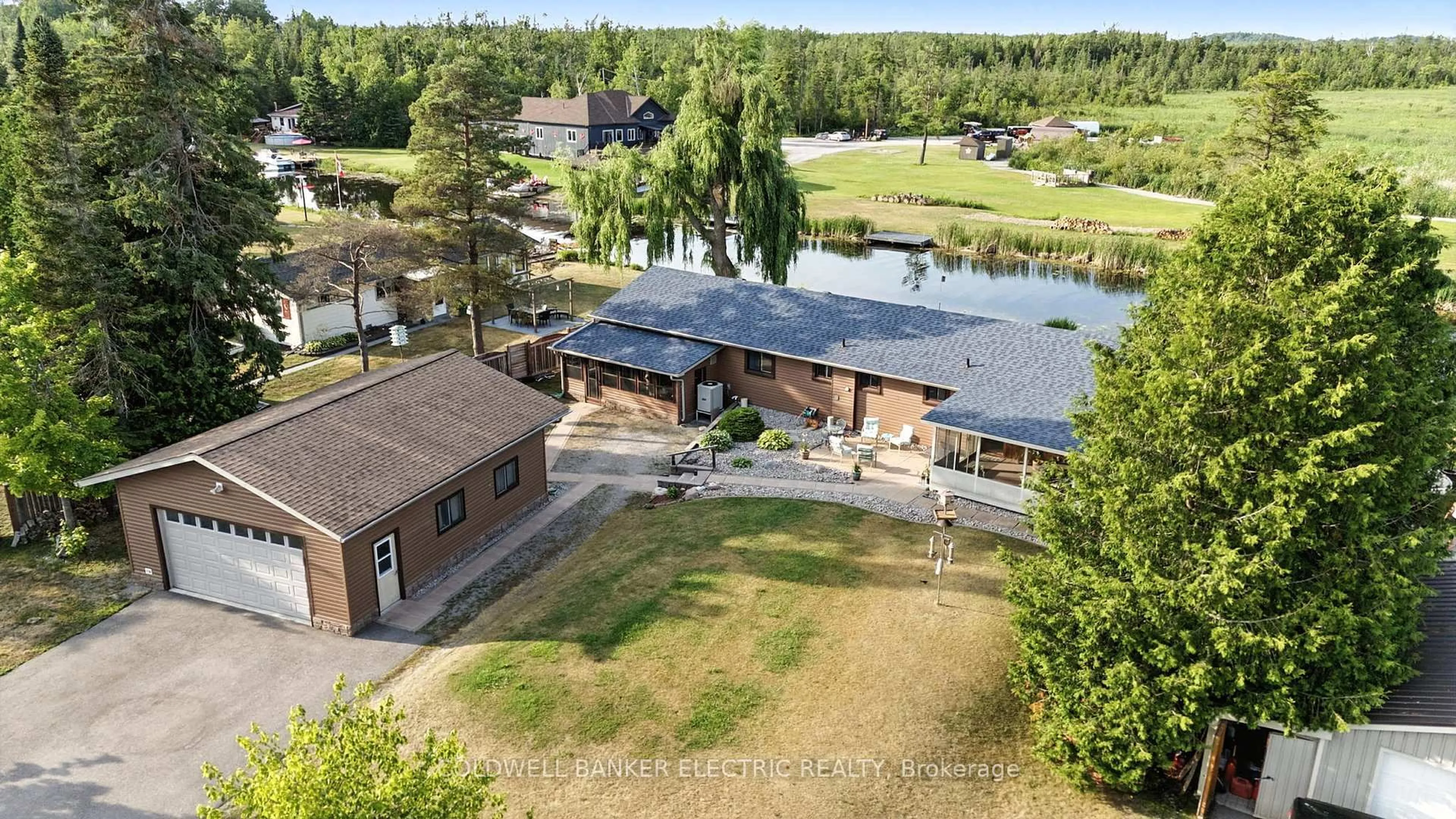 A pic from outside/outdoor area/front of a property/back of a property/a pic from drone, water/lake/river/ocean view for 63 South Bayou Rd, Kawartha Lakes Ontario K0M 1N0
