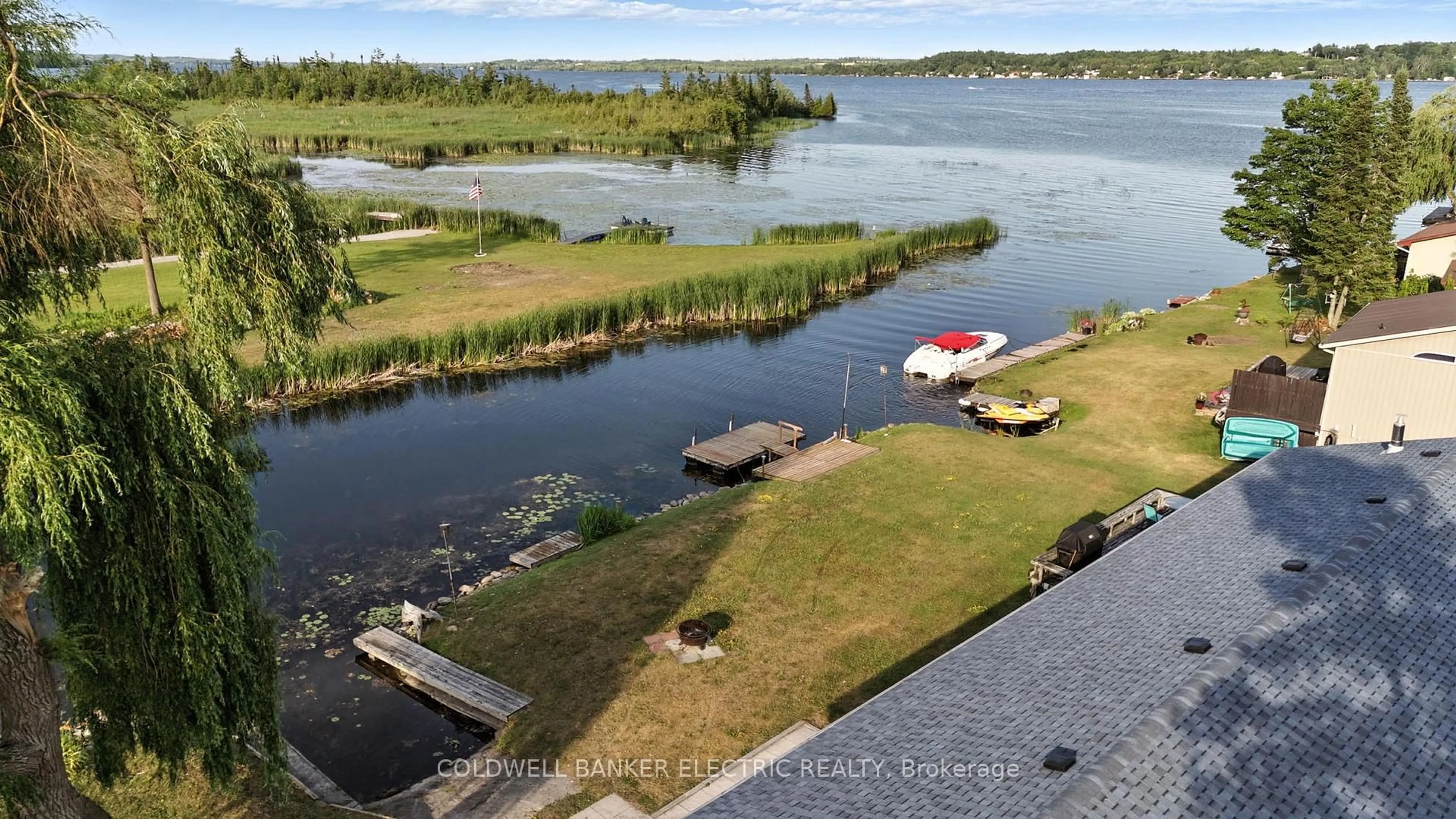 A pic from outside/outdoor area/front of a property/back of a property/a pic from drone, water/lake/river/ocean view for 63 South Bayou Rd, Kawartha Lakes Ontario K0M 1N0
