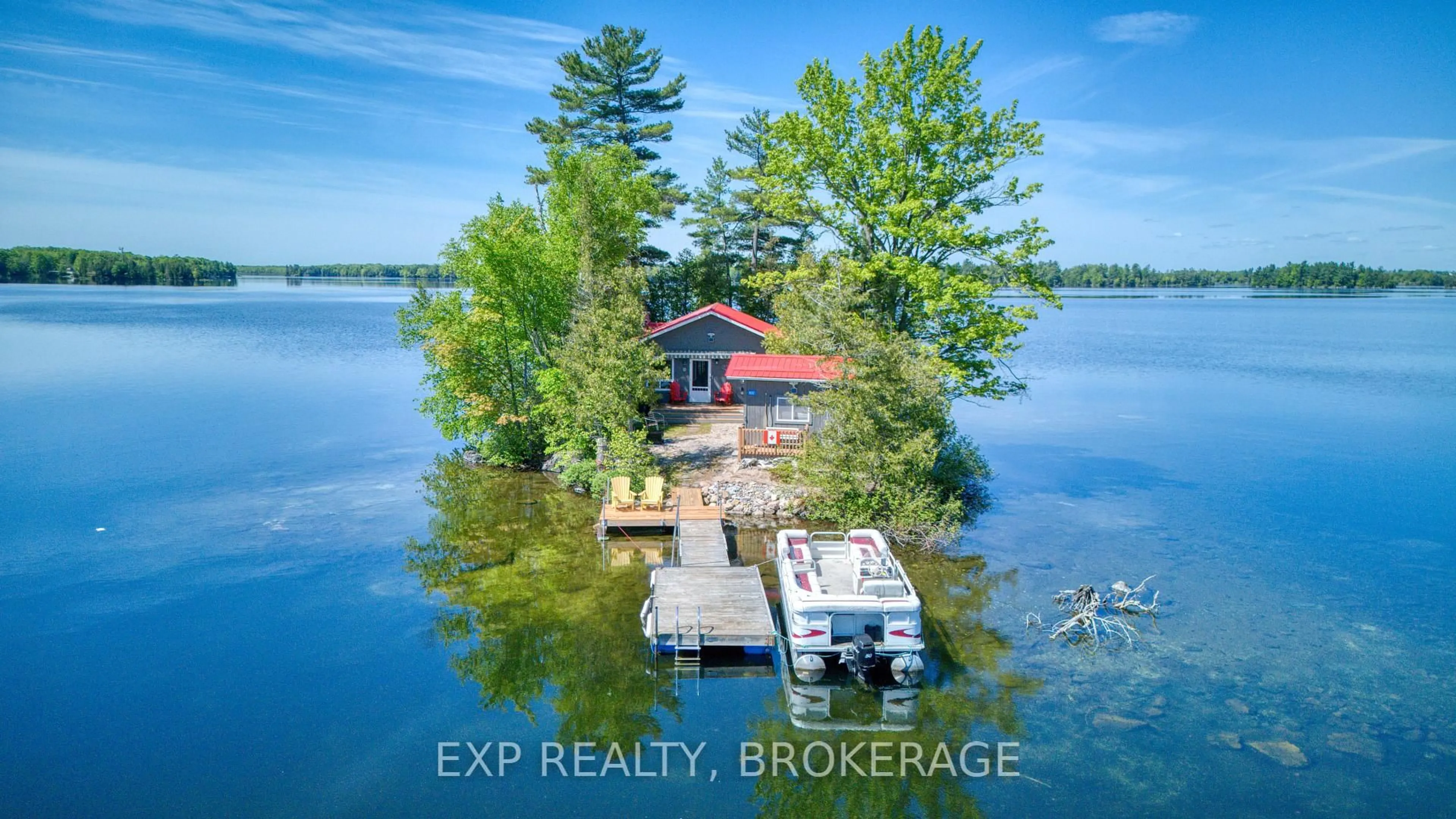 A pic from outside/outdoor area/front of a property/back of a property/a pic from drone, water/lake/river/ocean view for 832 Sharbot Lake, Mountain Grove Ontario K0H 2E0