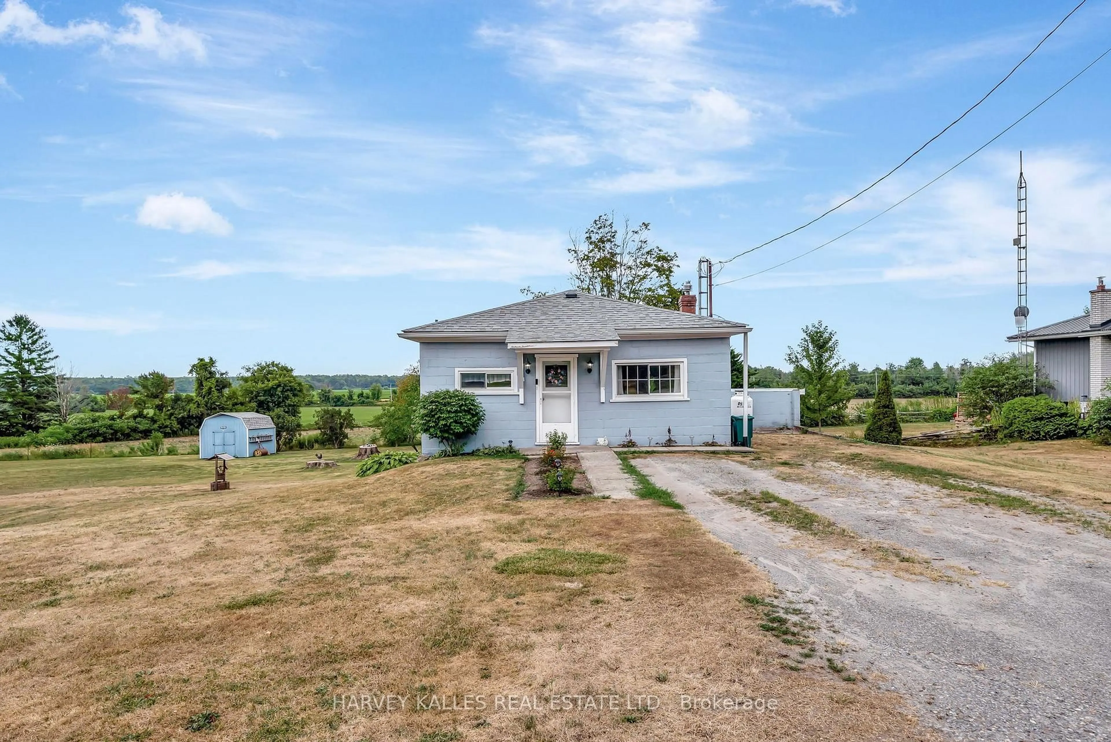 A pic from outside/outdoor area/front of a property/back of a property/a pic from drone, unknown for 13997 Loyalist Pkwy, Prince Edward County Ontario K0K 2T0