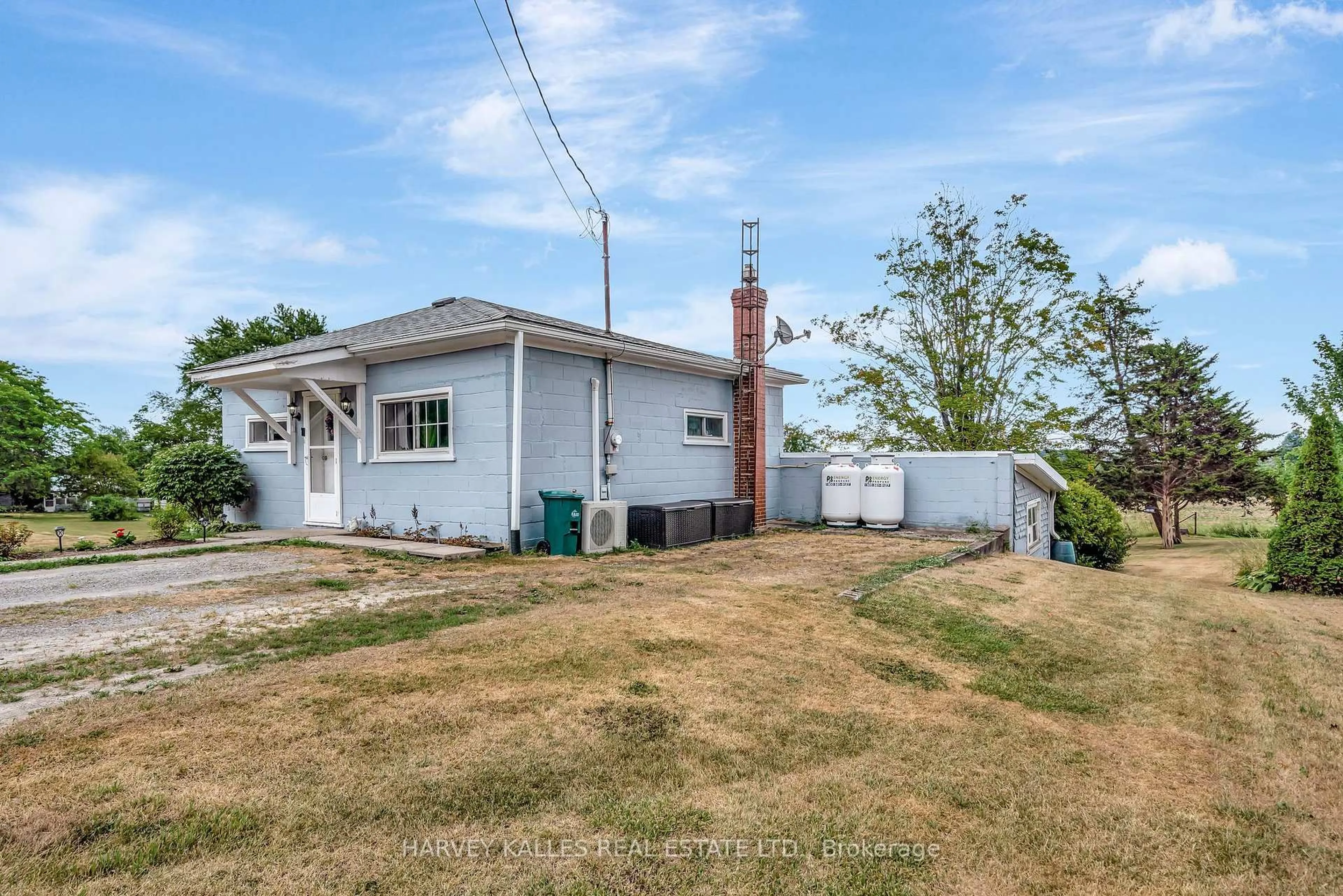 A pic from outside/outdoor area/front of a property/back of a property/a pic from drone, street for 13997 Loyalist Pkwy, Prince Edward County Ontario K0K 2T0