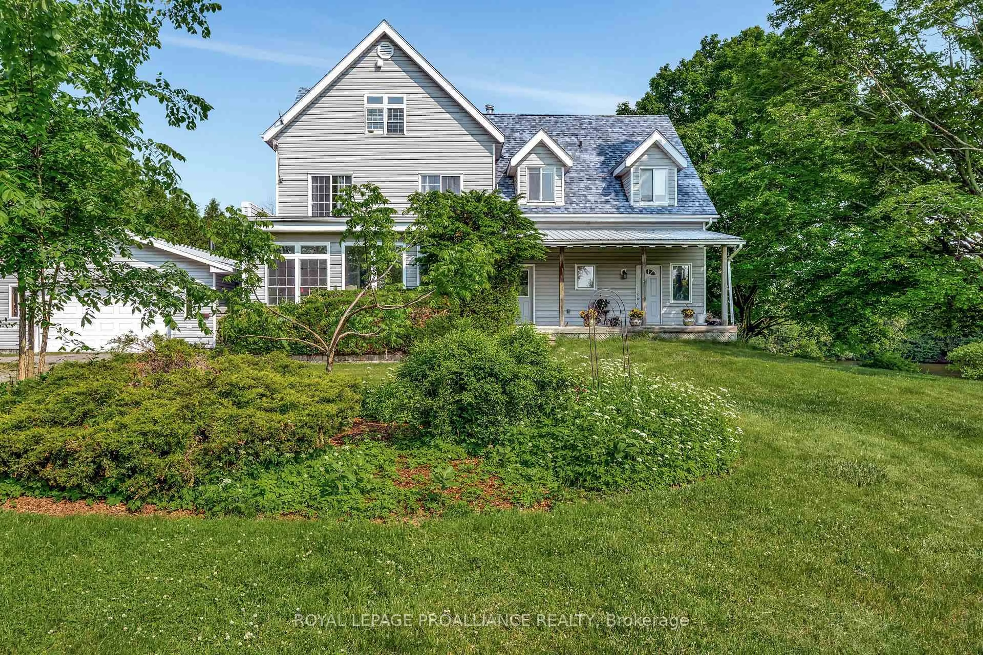 A pic from outside/outdoor area/front of a property/back of a property/a pic from drone, street for 2925 County Road 10, Prince Edward County Ontario K0K 2P0