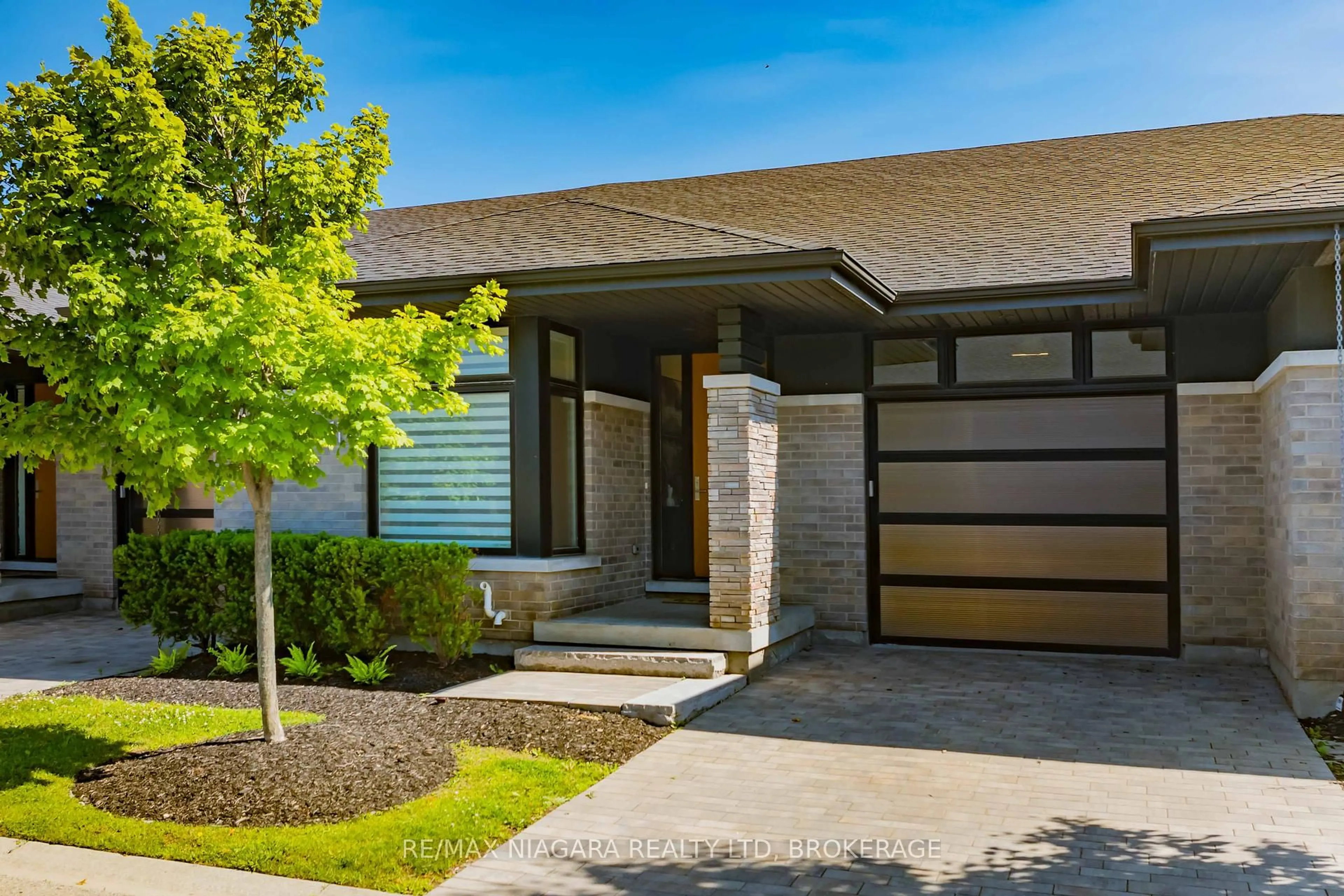 Home with brick exterior material, street for 7276 Optimist Lane #11, Niagara Falls Ontario L2E 0B3