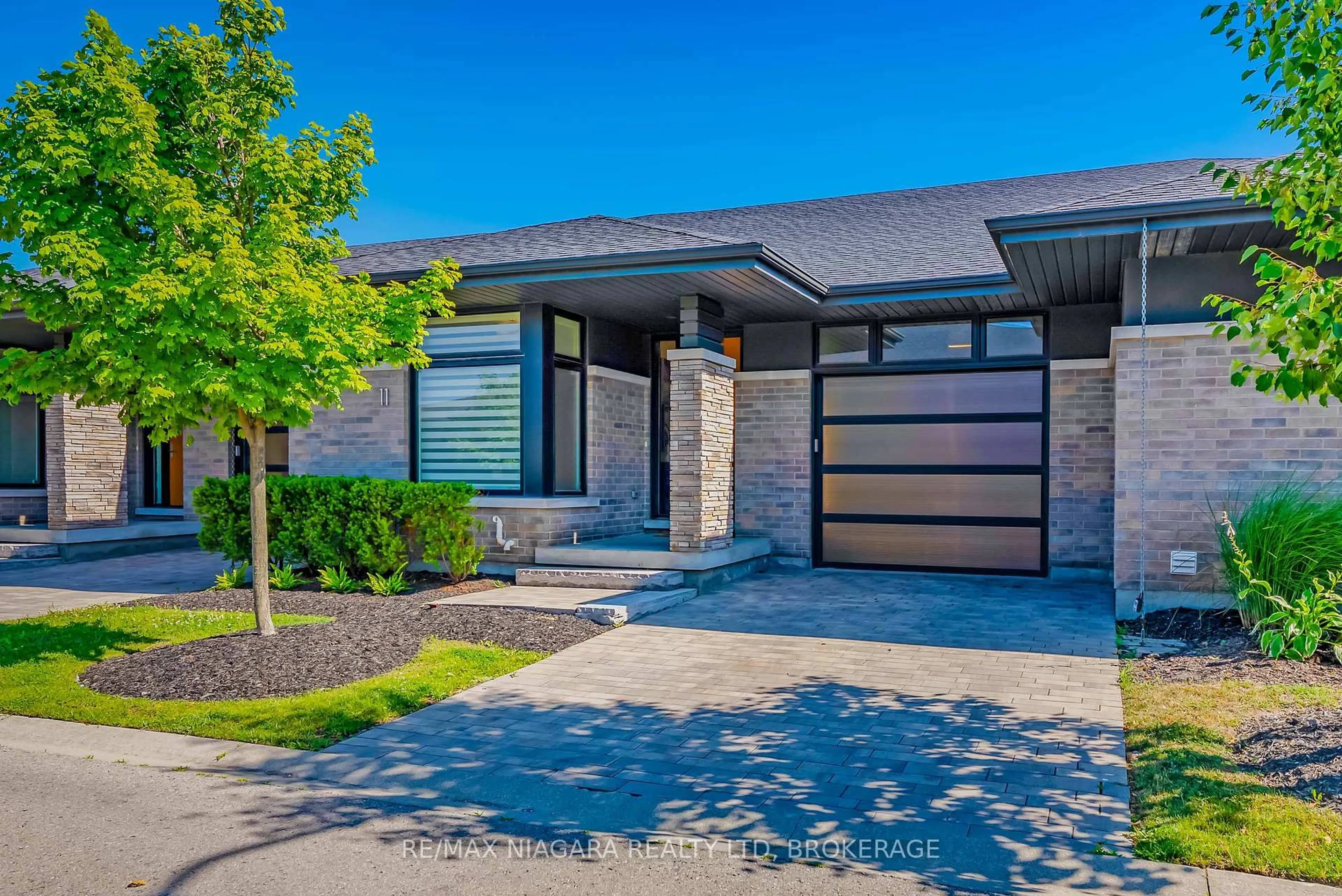 Home with brick exterior material, street for 7276 Optimist Lane #11, Niagara Falls Ontario L2E 0B3