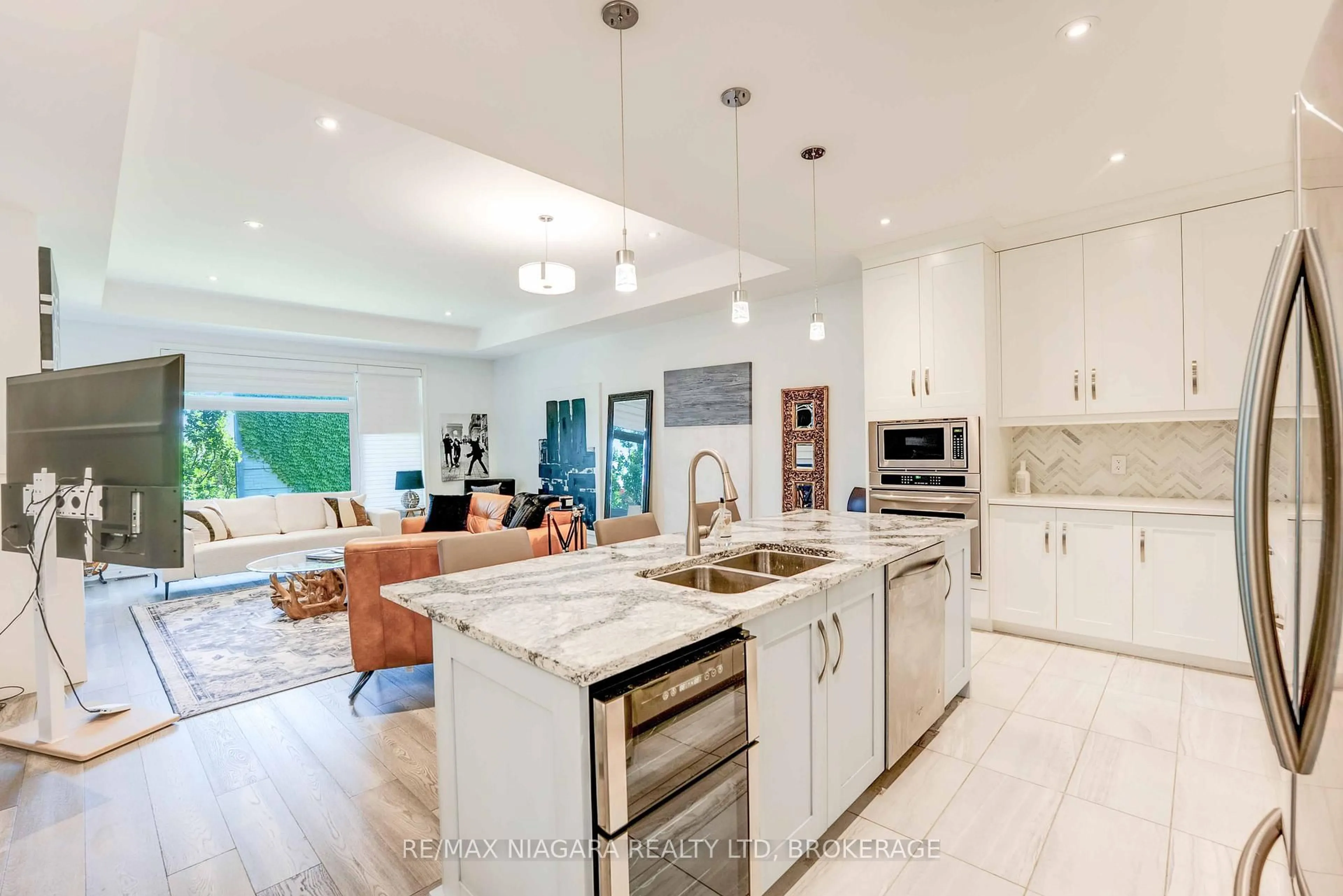Open concept kitchen, ceramic/tile floor for 7276 Optimist Lane #11, Niagara Falls Ontario L2E 0B3