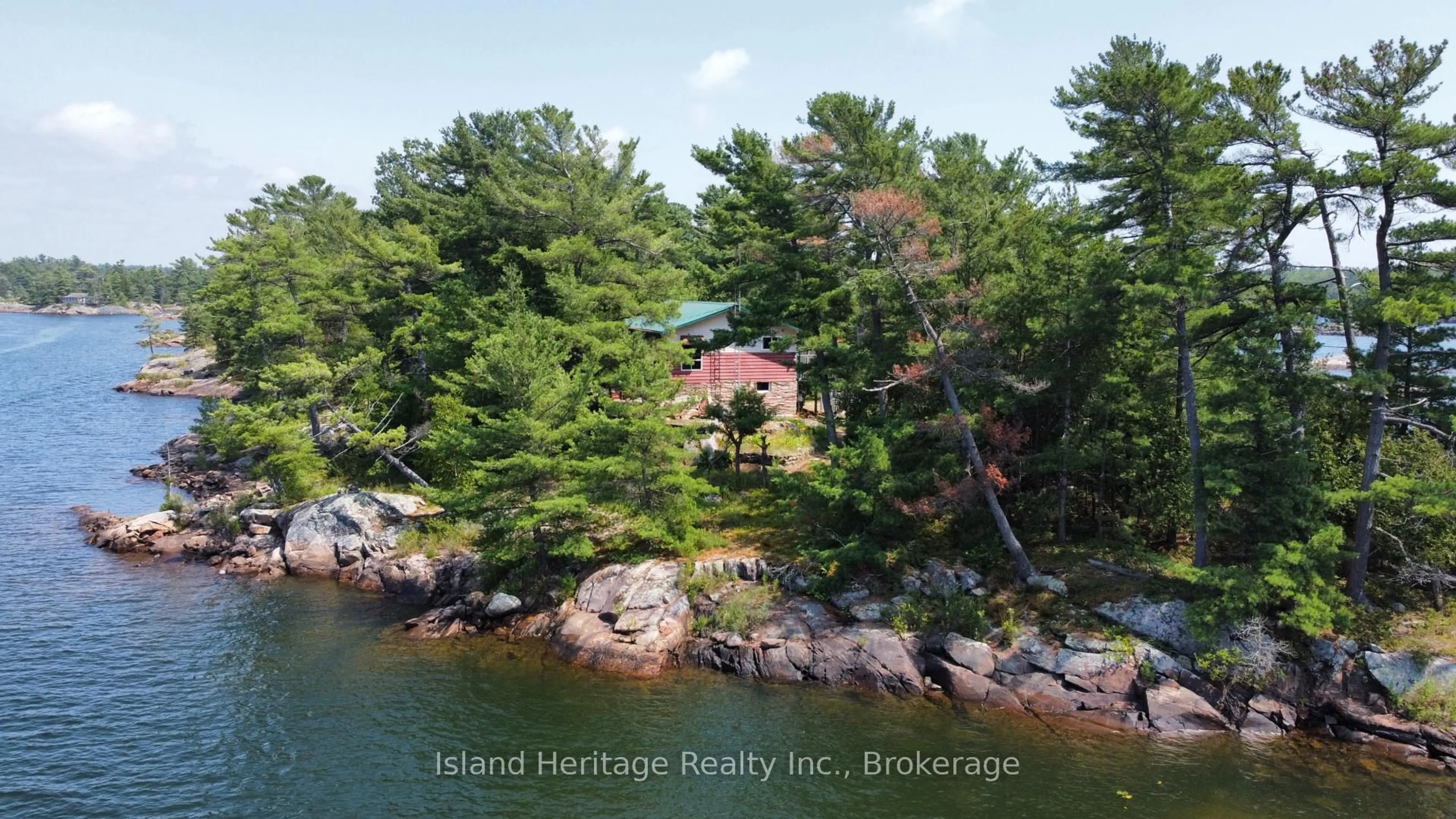 A pic from outside/outdoor area/front of a property/back of a property/a pic from drone, water/lake/river/ocean view for 1915 Georgian Bay Island, The Archipelago Ontario P0G 1K0