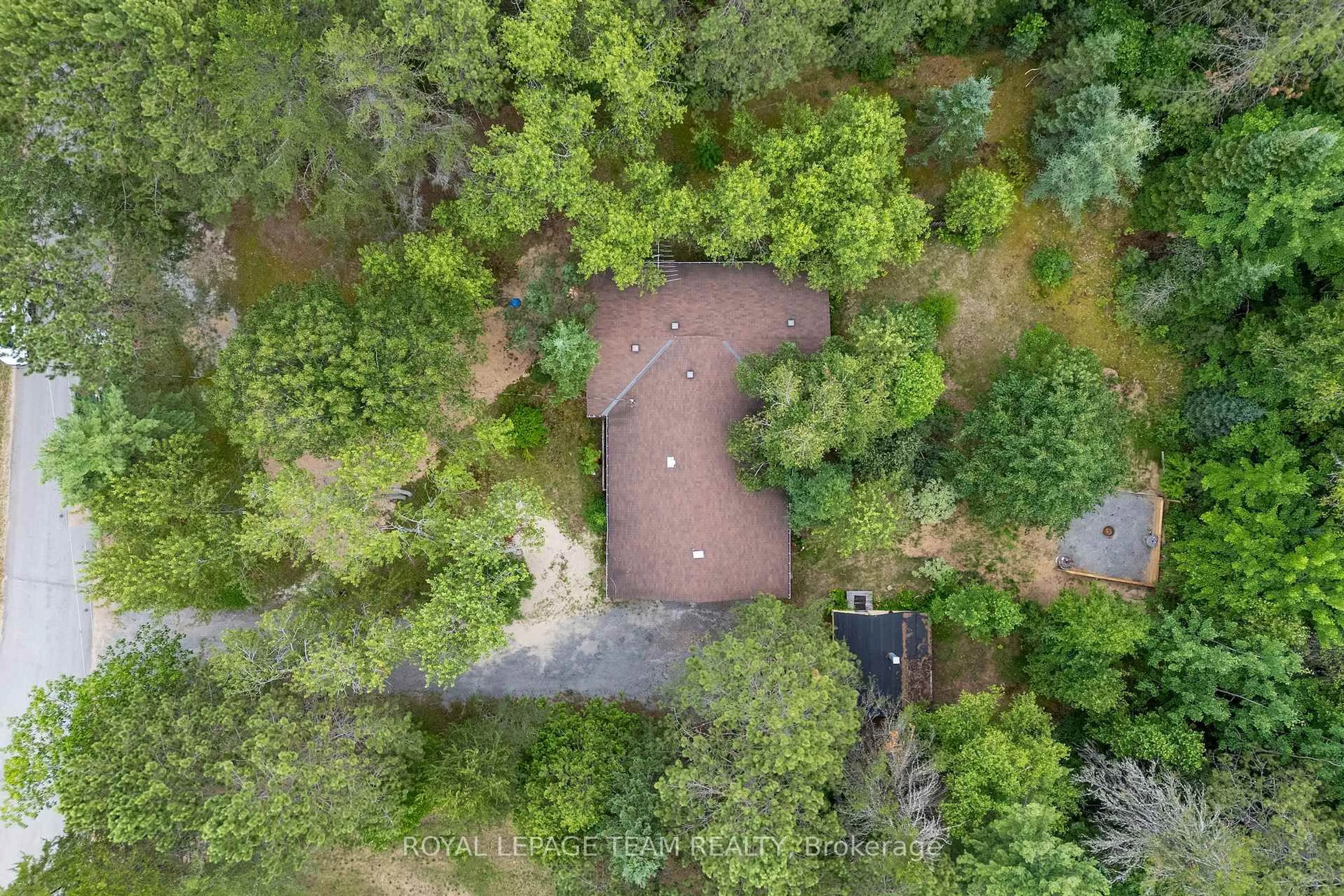 A pic from outside/outdoor area/front of a property/back of a property/a pic from drone, forest/trees view for 4 MURCHISON Rd, South Algonquin Ontario K0J 2C0