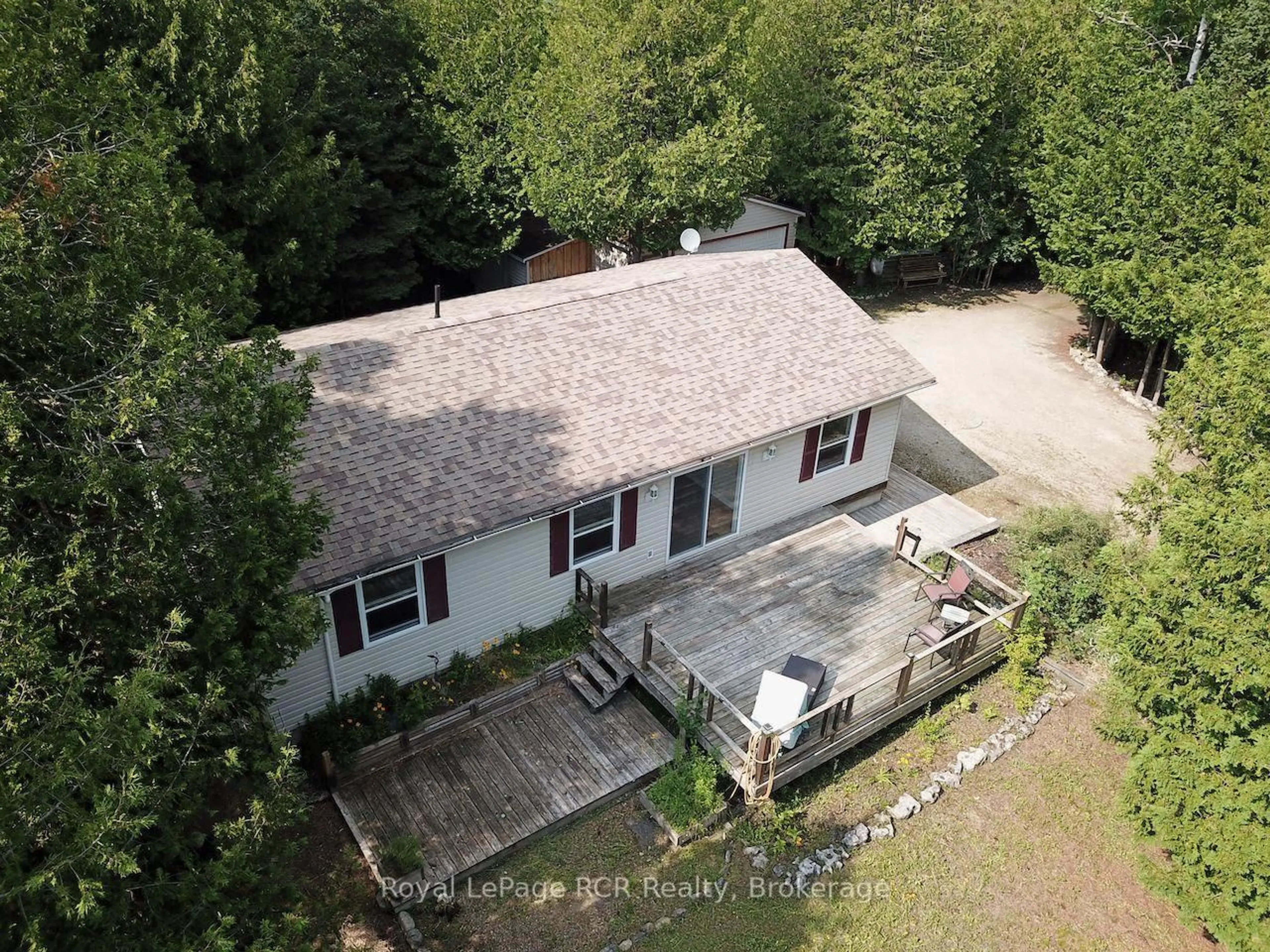 A pic from outside/outdoor area/front of a property/back of a property/a pic from drone, unknown for 323 East Road Rr 4 Rd, Northern Bruce Peninsula Ontario N0H 1W0