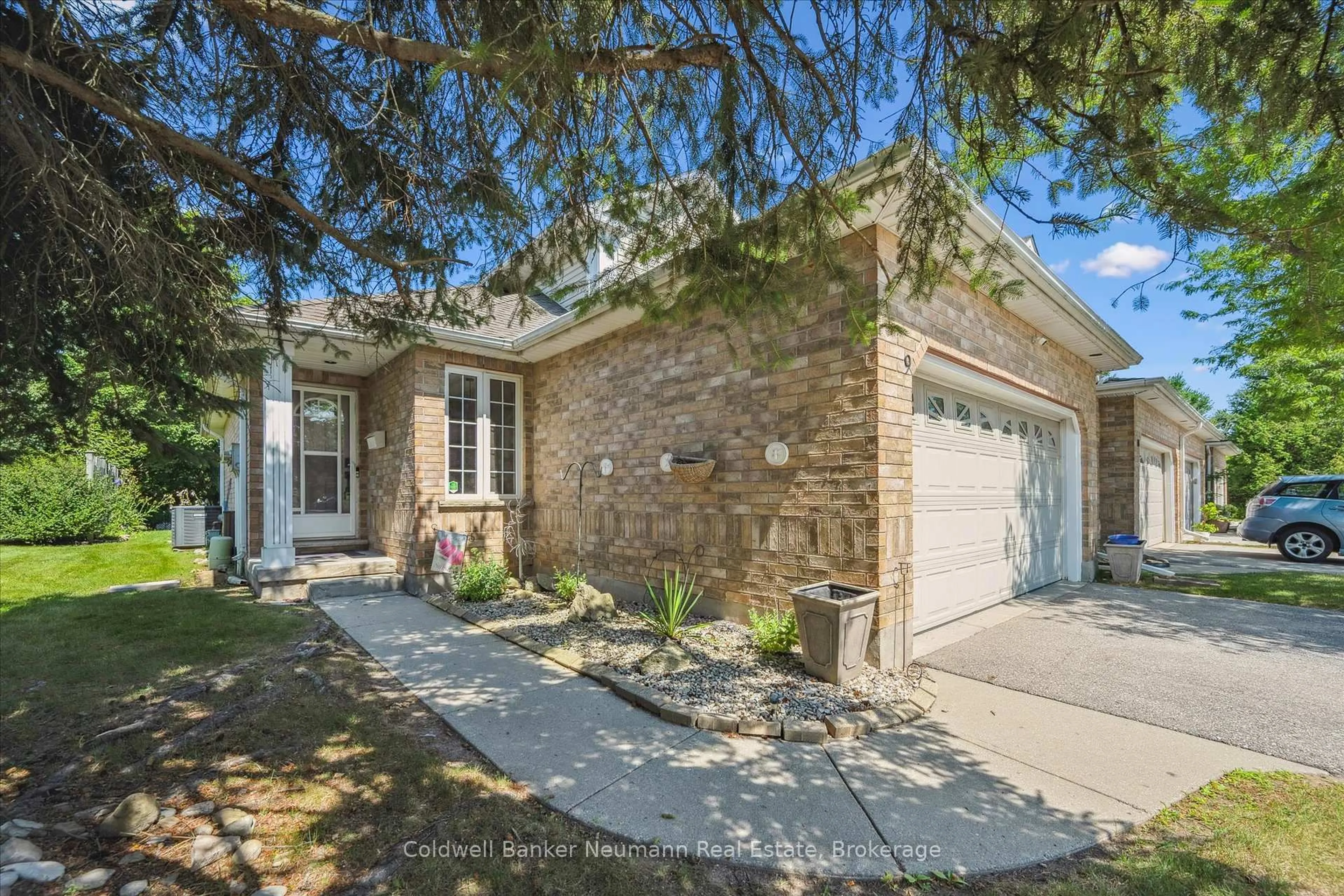 Home with brick exterior material, street for 1550 Gordon St #9, Guelph Ontario N1L 1C7