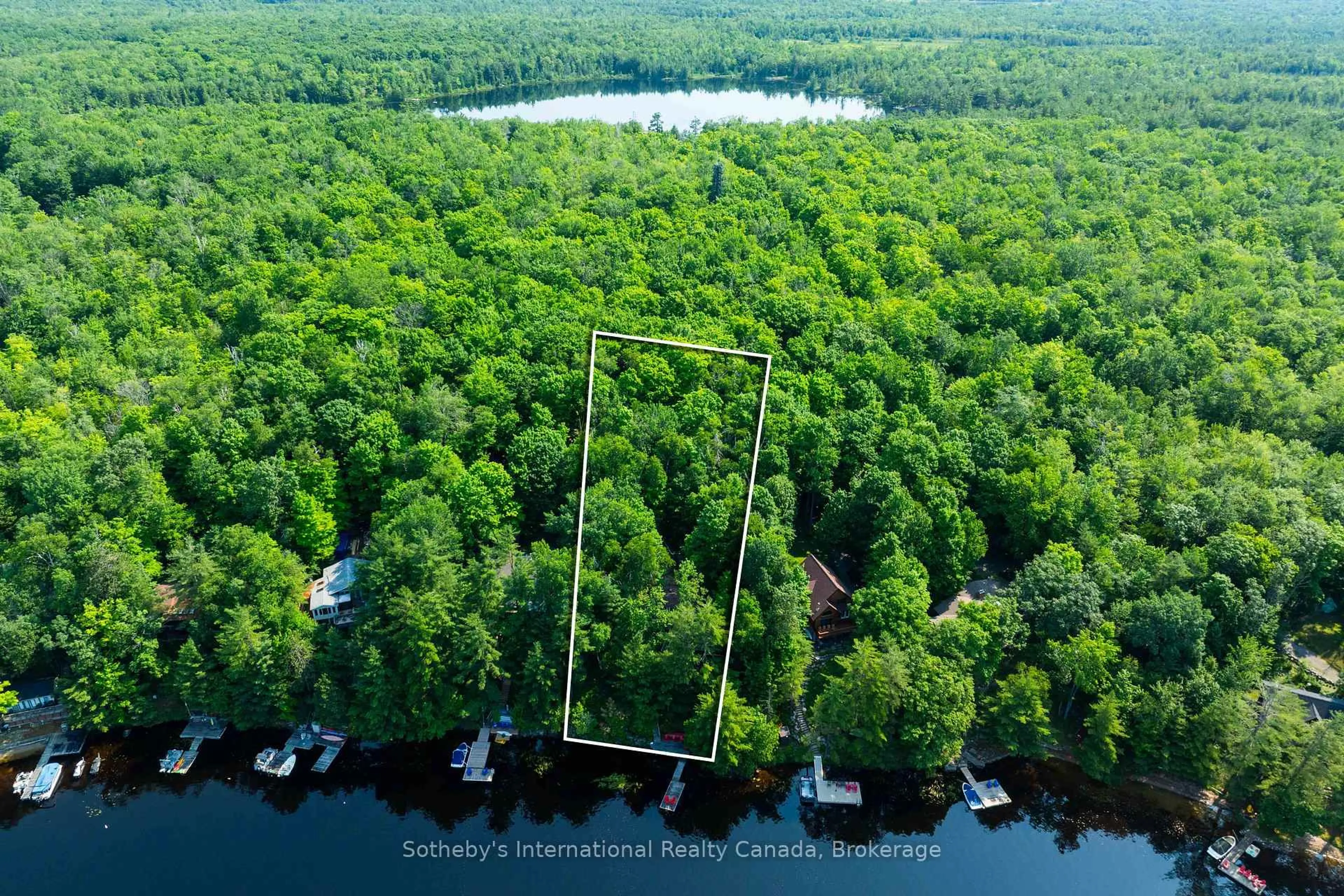 A pic from outside/outdoor area/front of a property/back of a property/a pic from drone, water/lake/river/ocean view for 1022 Summit Rd, Muskoka Lakes Ontario P0C 1M0