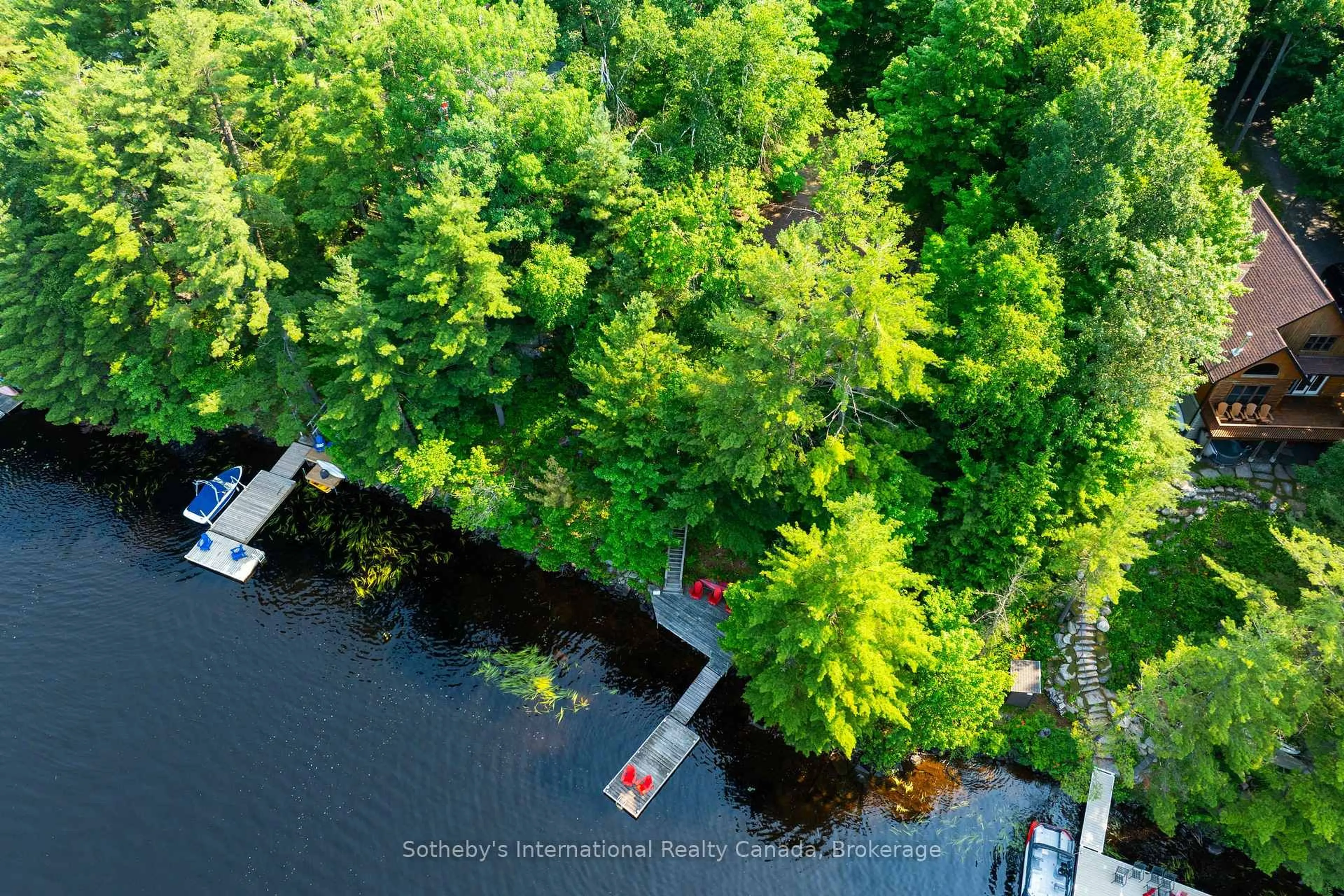A pic from outside/outdoor area/front of a property/back of a property/a pic from drone, water/lake/river/ocean view for 1022 Summit Rd, Muskoka Lakes Ontario P0C 1M0