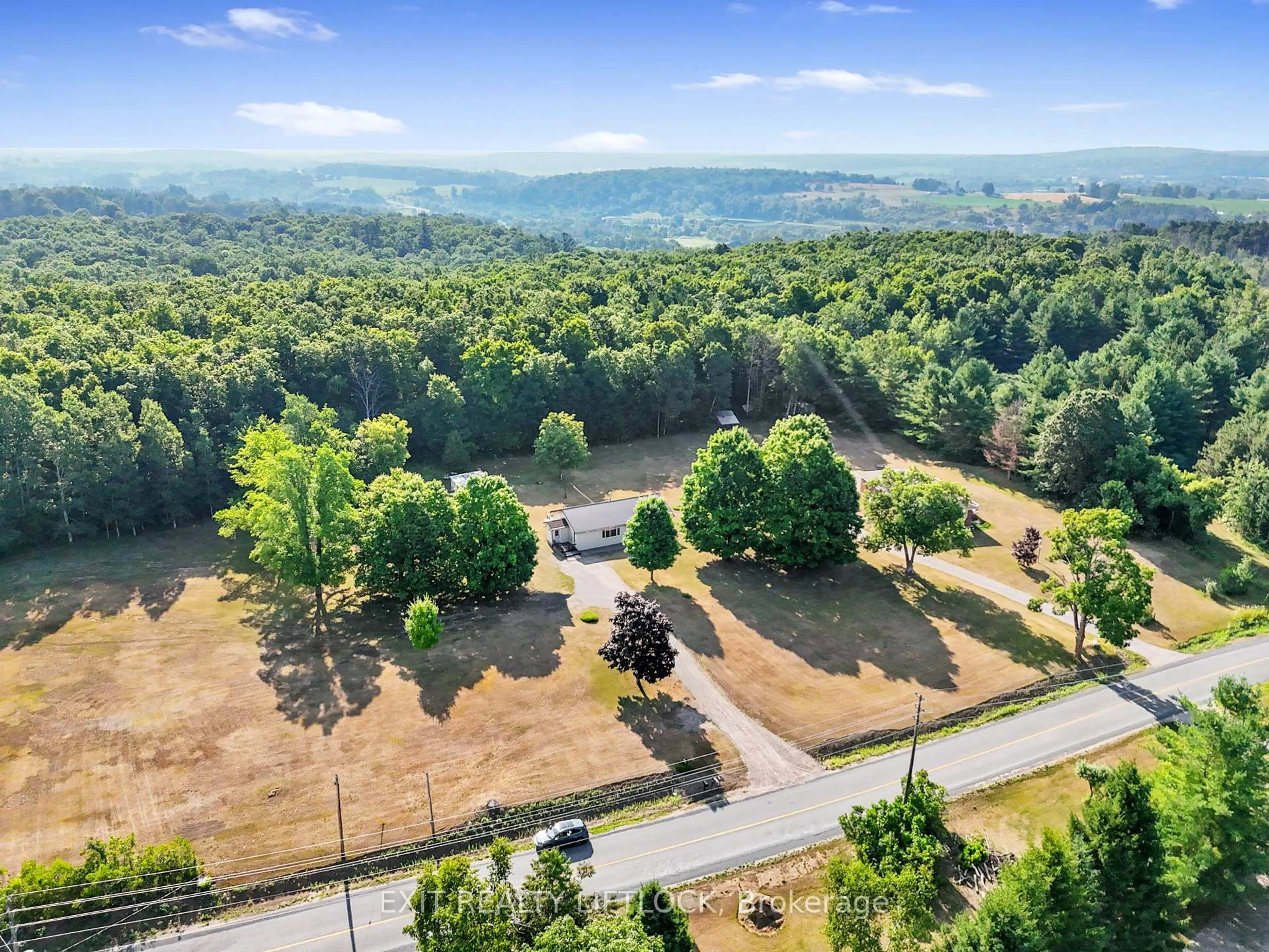 A pic from outside/outdoor area/front of a property/back of a property/a pic from drone, forest/trees view for 45 Godolphin Rd, Trent Hills Ontario K0K 3K0