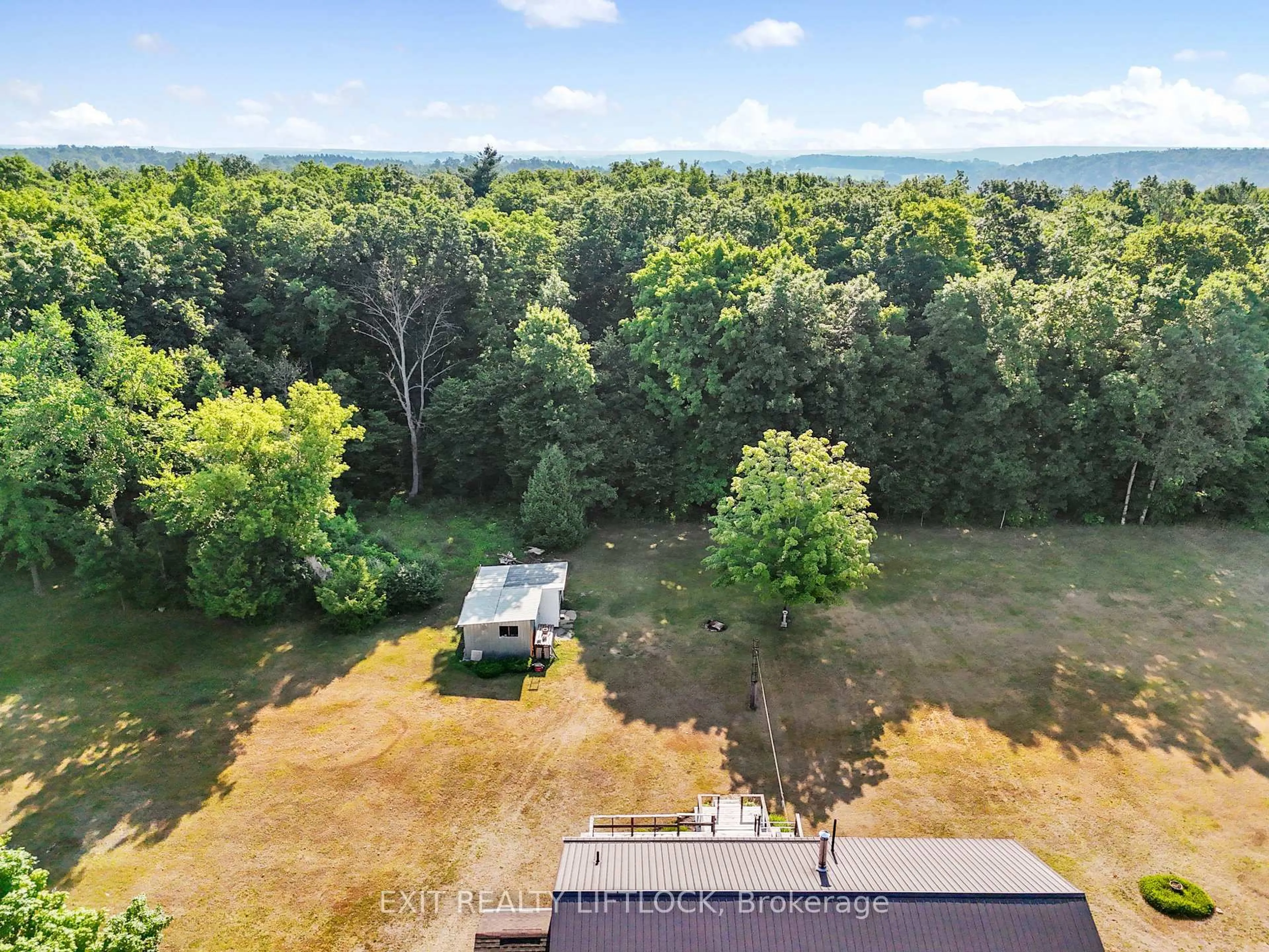 A pic from outside/outdoor area/front of a property/back of a property/a pic from drone, forest/trees view for 45 Godolphin Rd, Trent Hills Ontario K0K 3K0