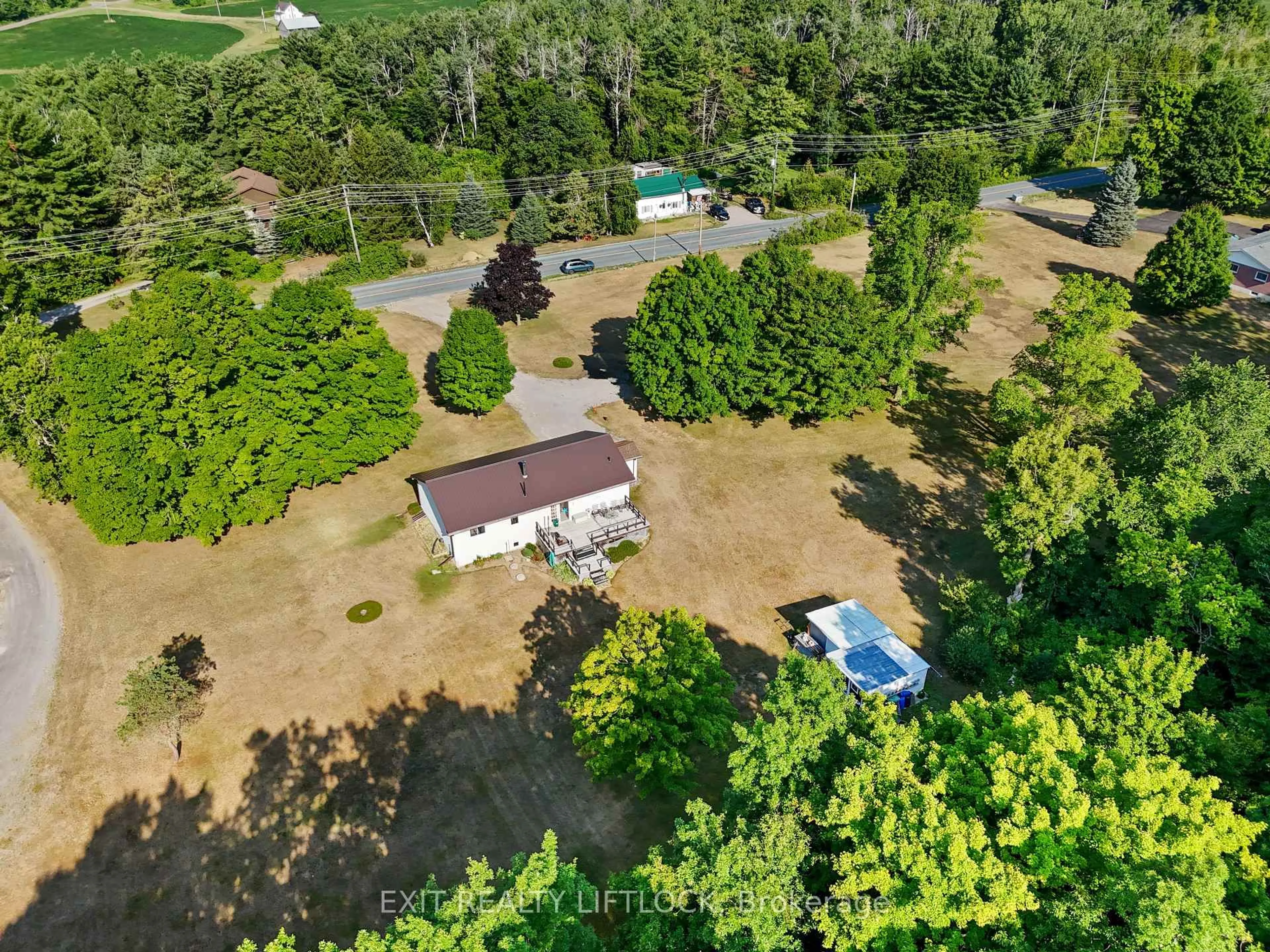 A pic from outside/outdoor area/front of a property/back of a property/a pic from drone, forest/trees view for 45 Godolphin Rd, Trent Hills Ontario K0K 3K0