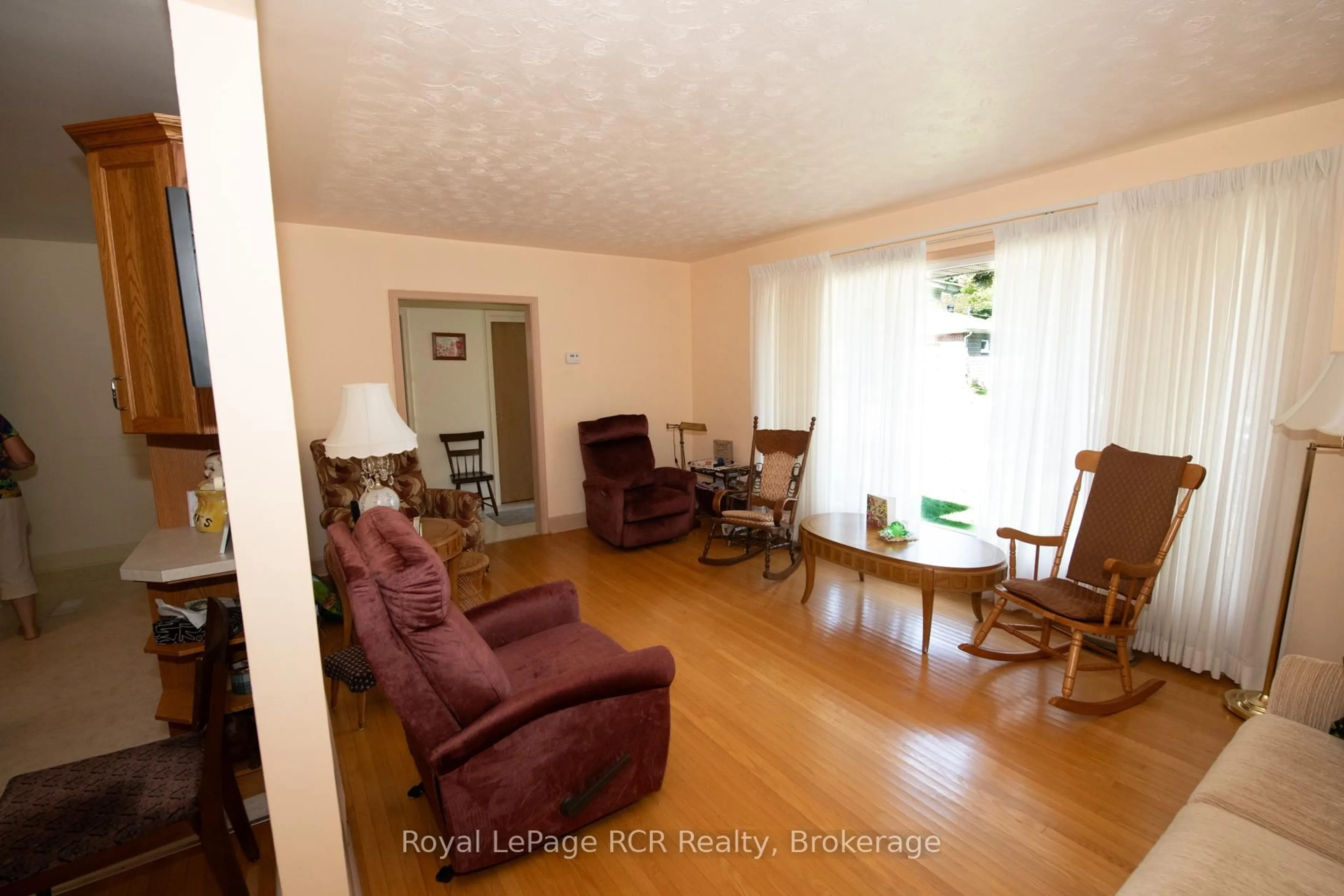 Living room with furniture, wood/laminate floor for 258 BIRMINGHAM St, Wellington North Ontario N0G 2L1