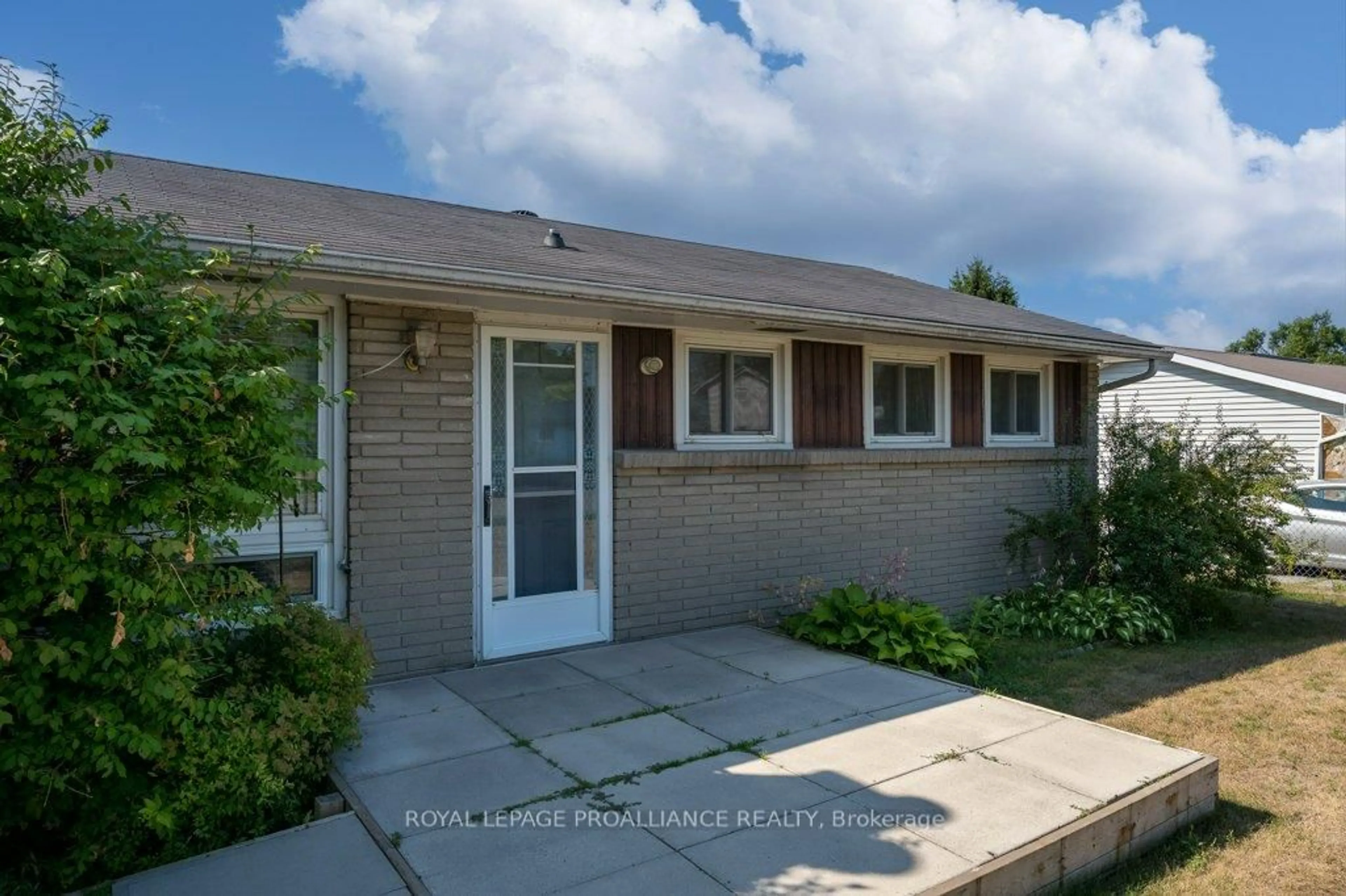 Home with vinyl exterior material, street for 24 Quinte Rd, Quinte West Ontario K8V 5P5
