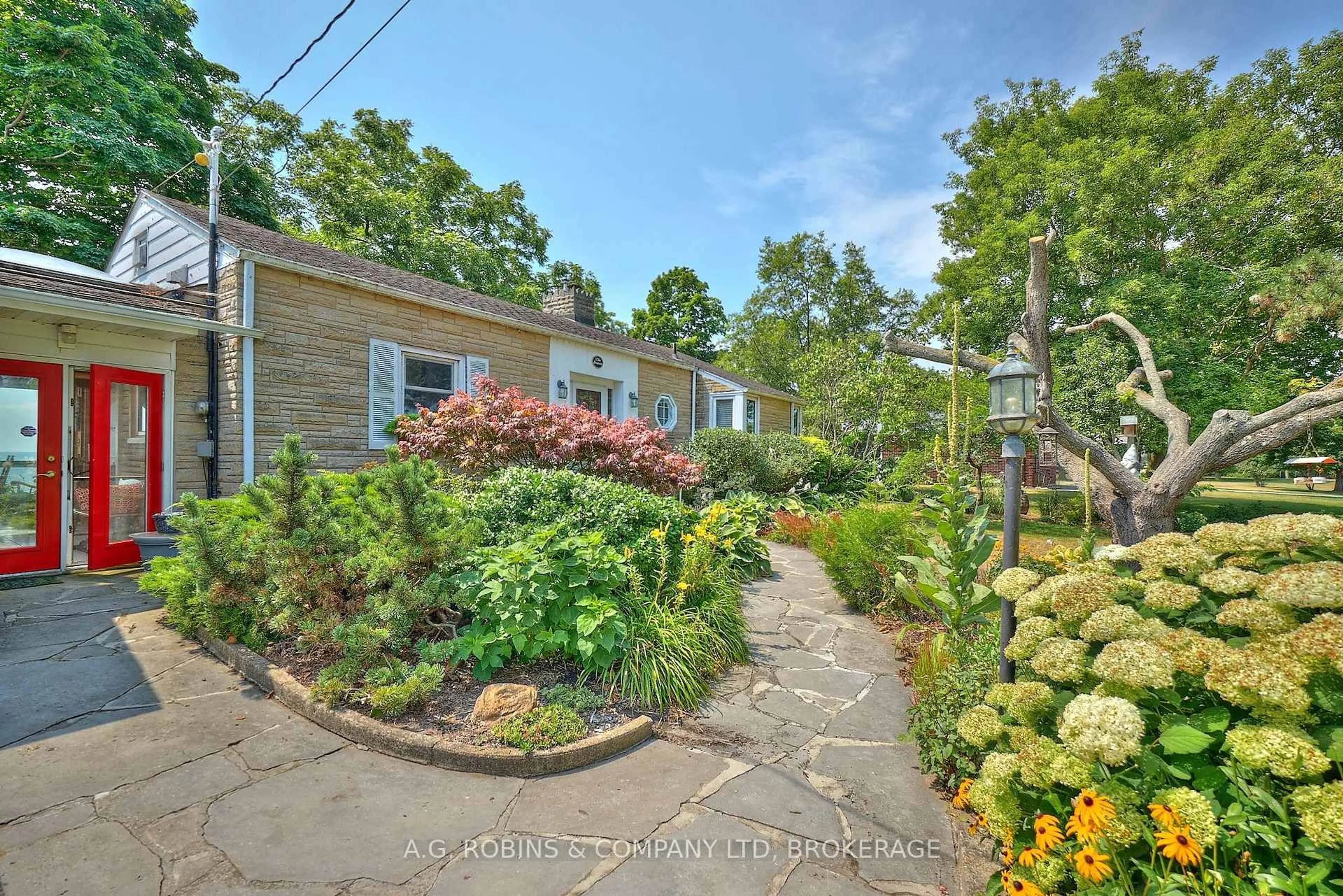 A pic from outside/outdoor area/front of a property/back of a property/a pic from drone, street for 10773 Lakeshore Rd, Wainfleet Ontario L3K 5V5