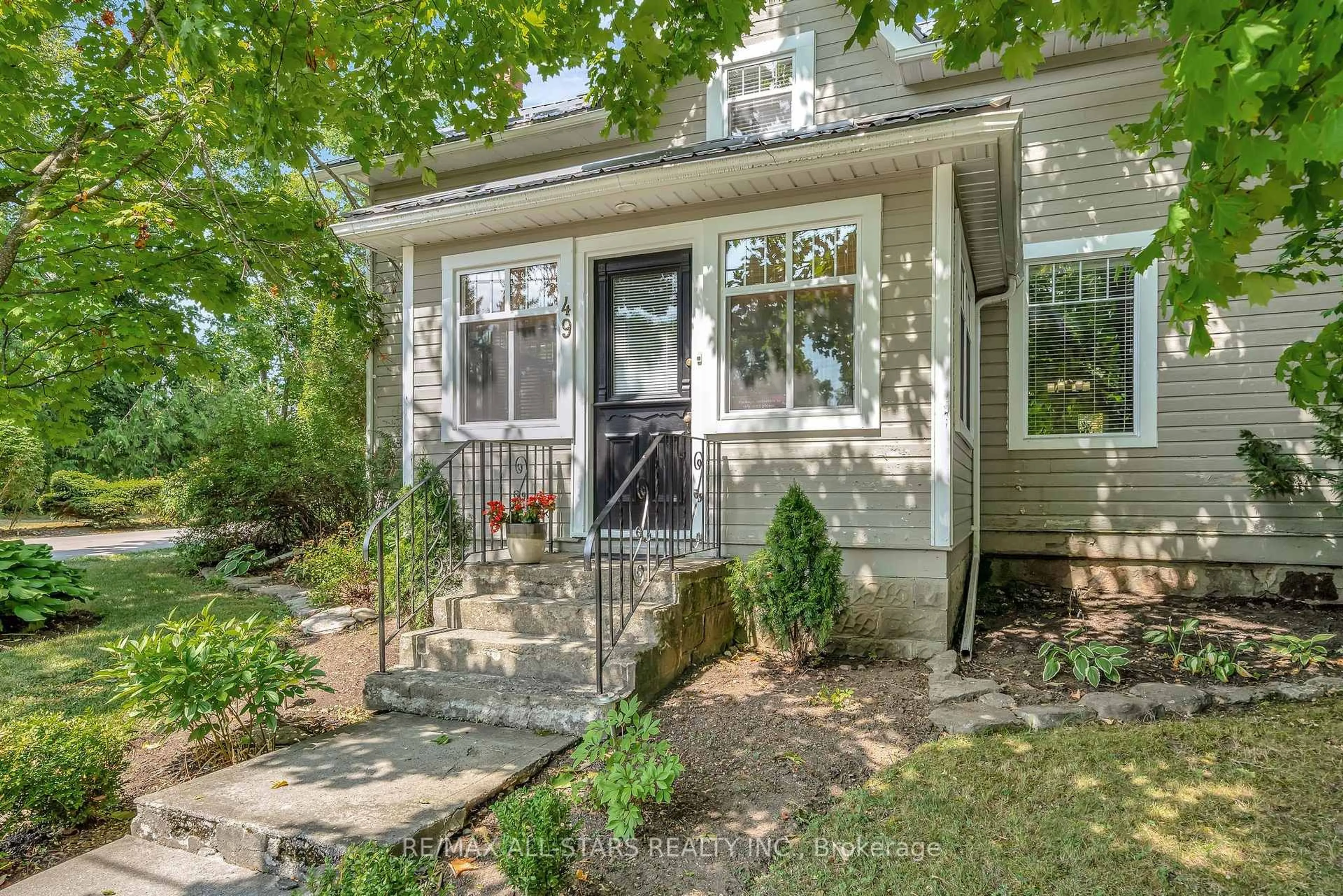 Home with vinyl exterior material, street for 49 John St, Kawartha Lakes Ontario K0M 1N0