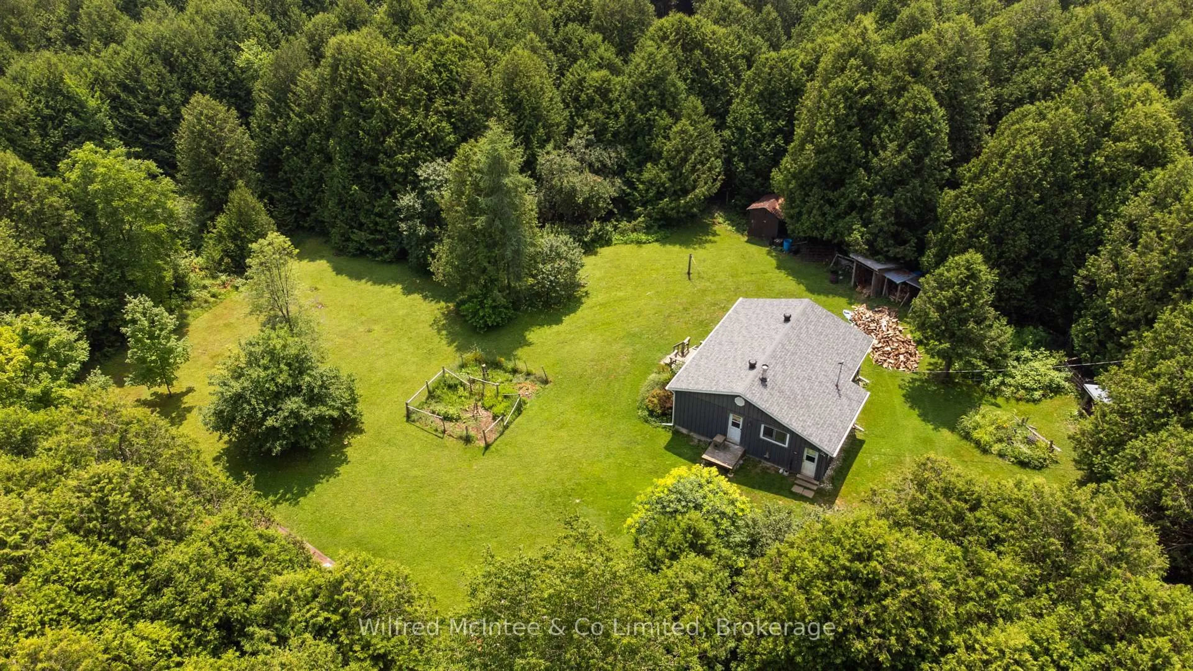 A pic from outside/outdoor area/front of a property/back of a property/a pic from drone, forest/trees view for 620026 Robson Rd, Chatsworth Ontario N0H 1R0