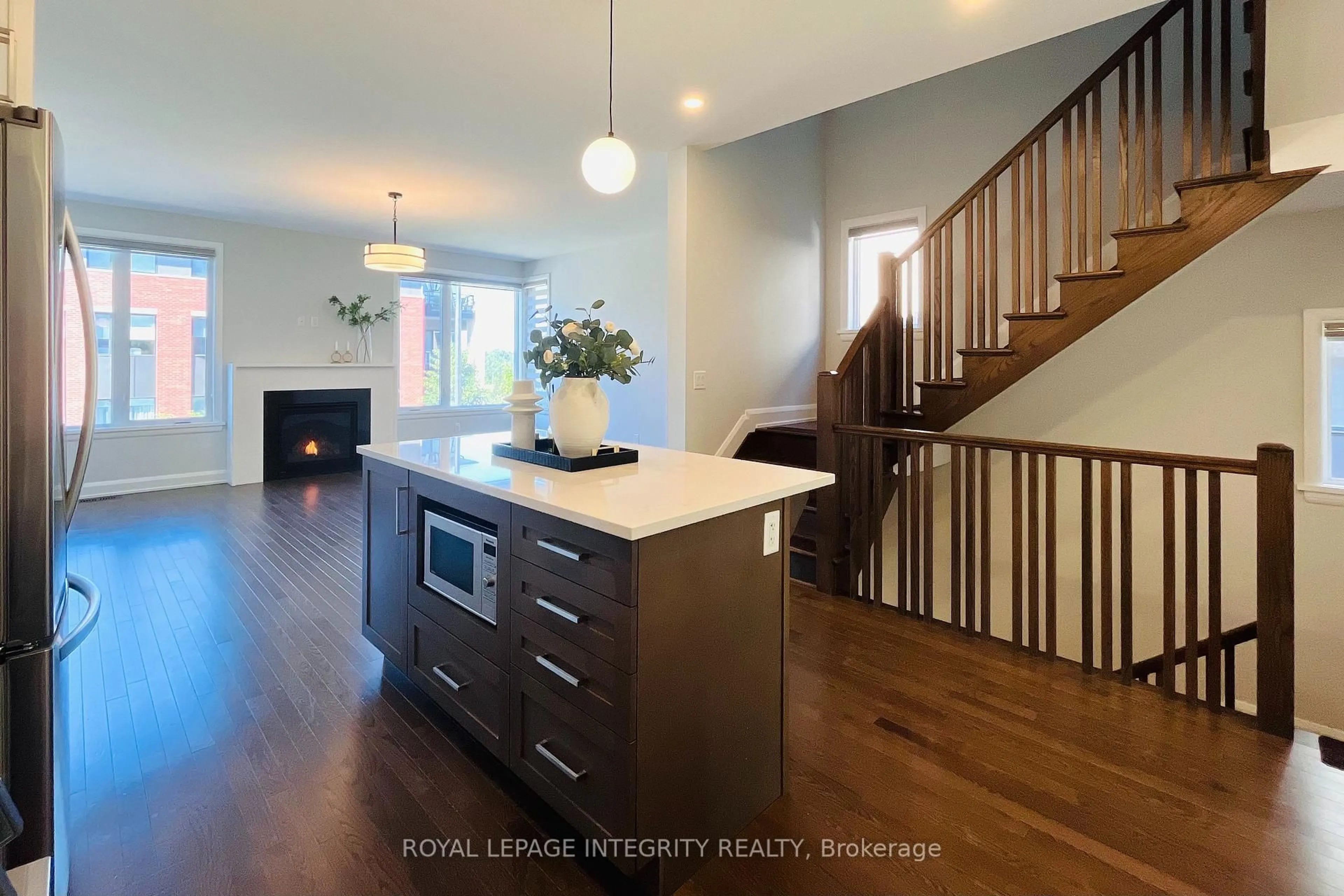 Open concept kitchen, wood/laminate floor for 147 Boundstone Way, Ottawa Ontario K2T 0M4