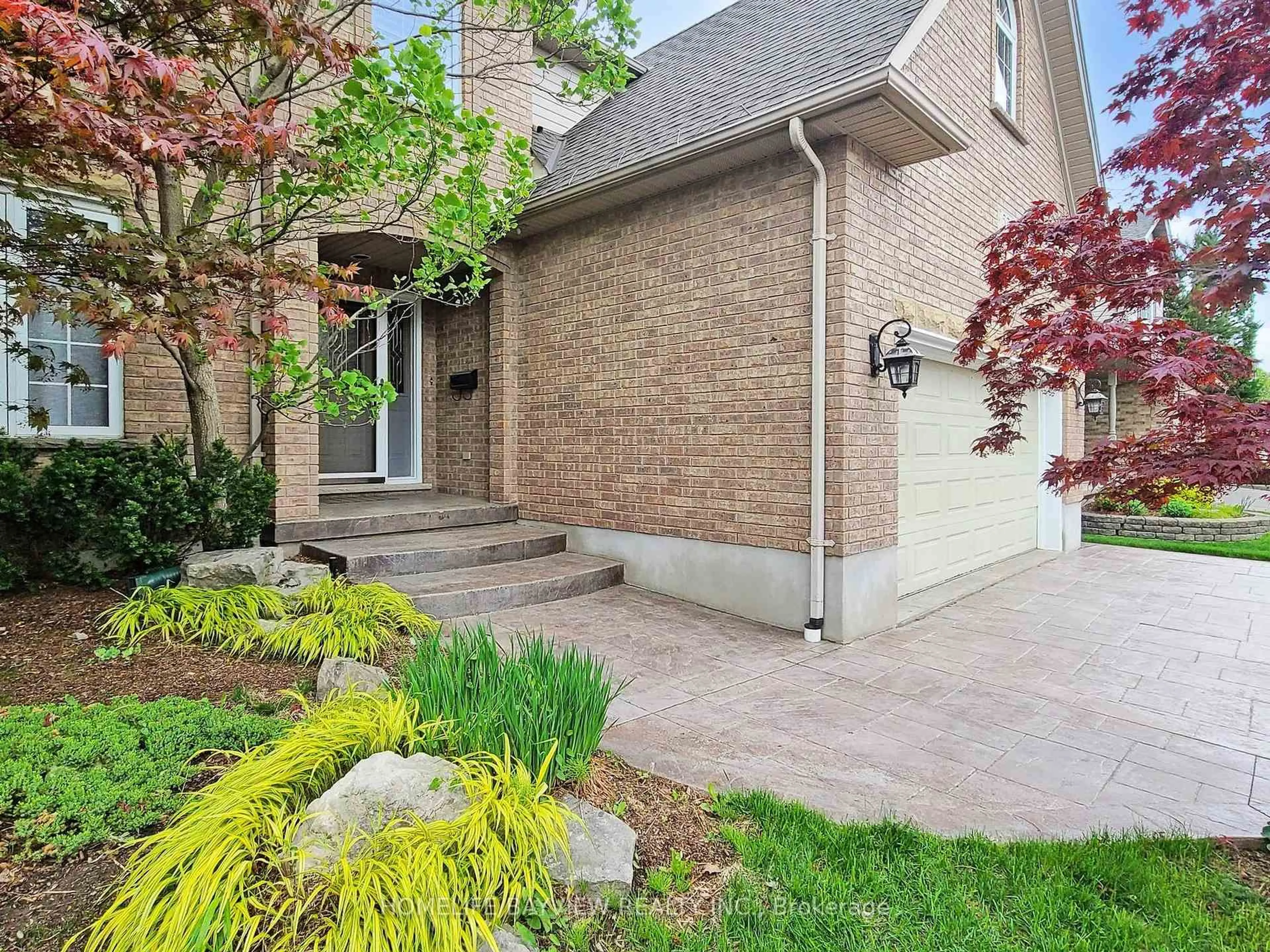 Home with brick exterior material, street for 574 Sandbanks Cres, Waterloo Ontario N2V 2K2