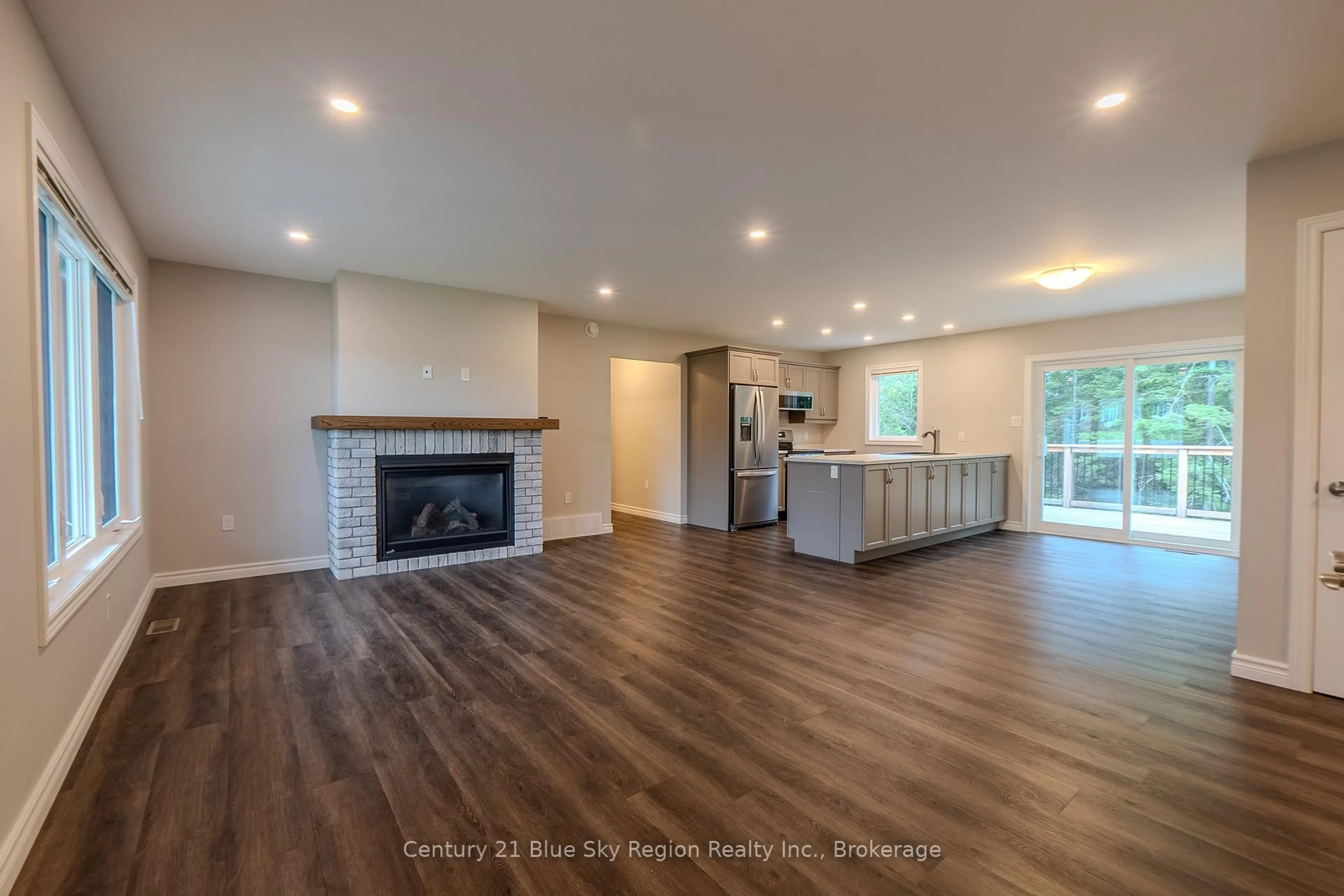 Open concept kitchen, wood/laminate floor for 177 CARMICHAEL Dr, North Bay Ontario P1B 8G2
