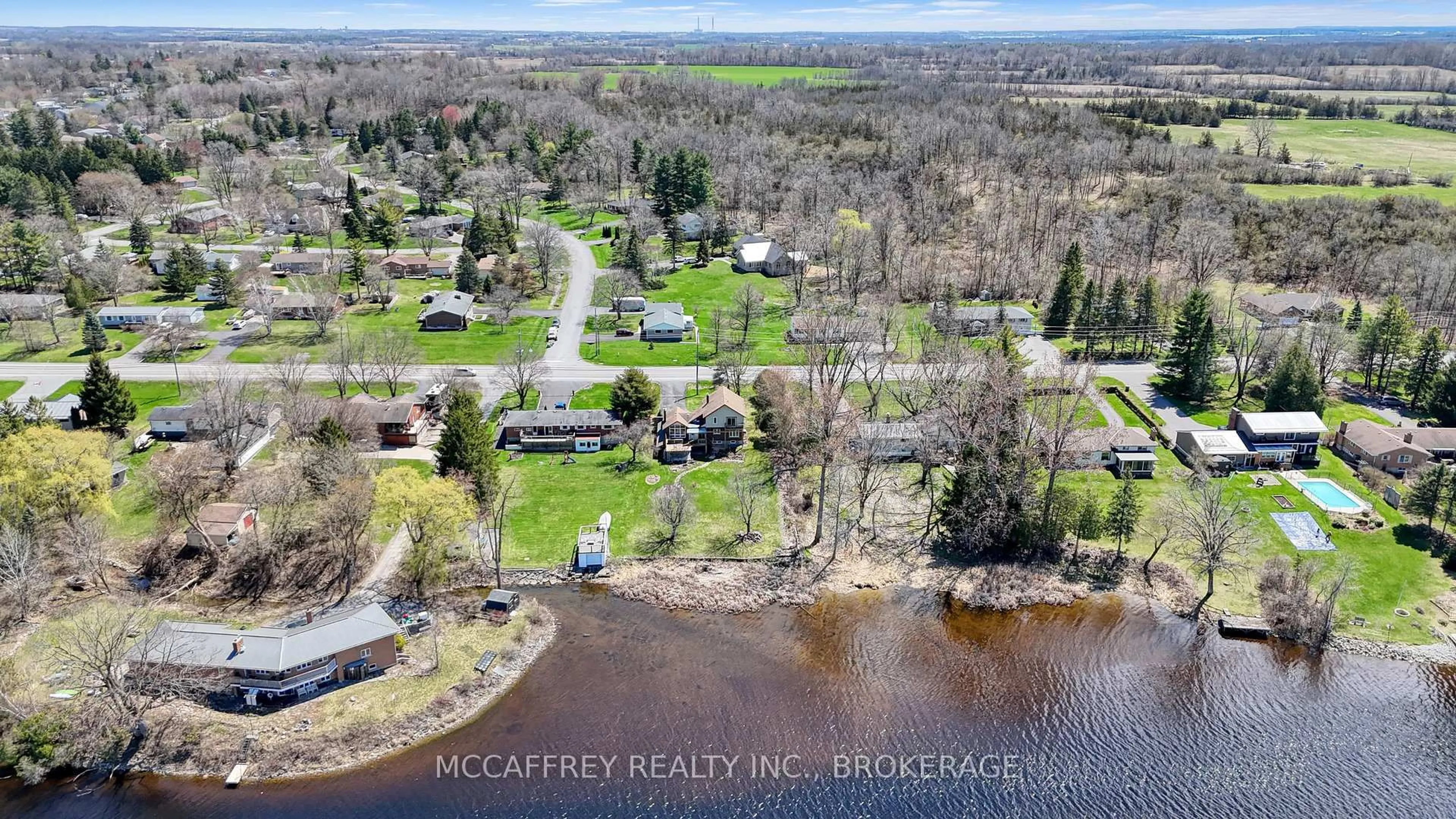 A pic from outside/outdoor area/front of a property/back of a property/a pic from drone, water/lake/river/ocean view for 79 River Rd, Greater Napanee Ontario K7R 3H3