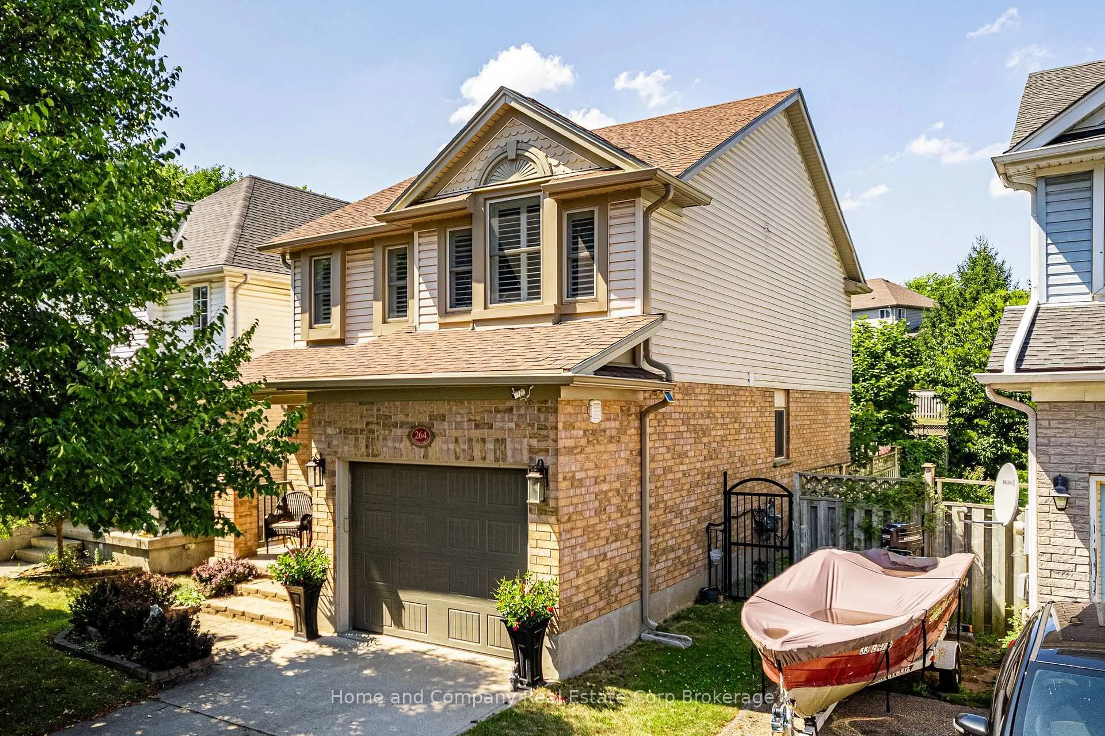 Home with brick exterior material, street for 264 Melran Dr, Cambridge Ontario N3C 4E5